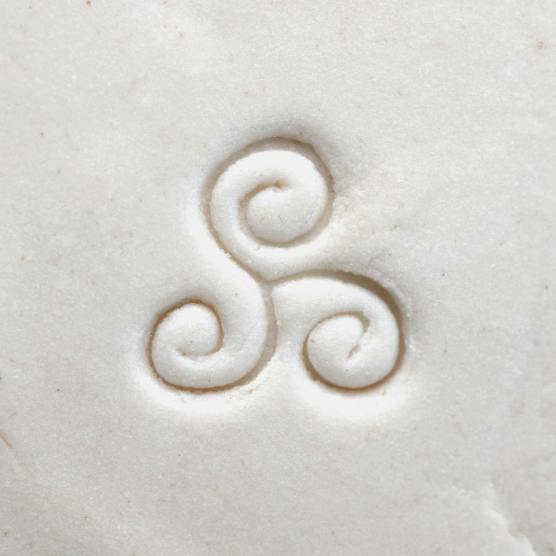 MKM Pottery Tools Small Round Stamp - SCS-118, Tri-Spiral applied to clay