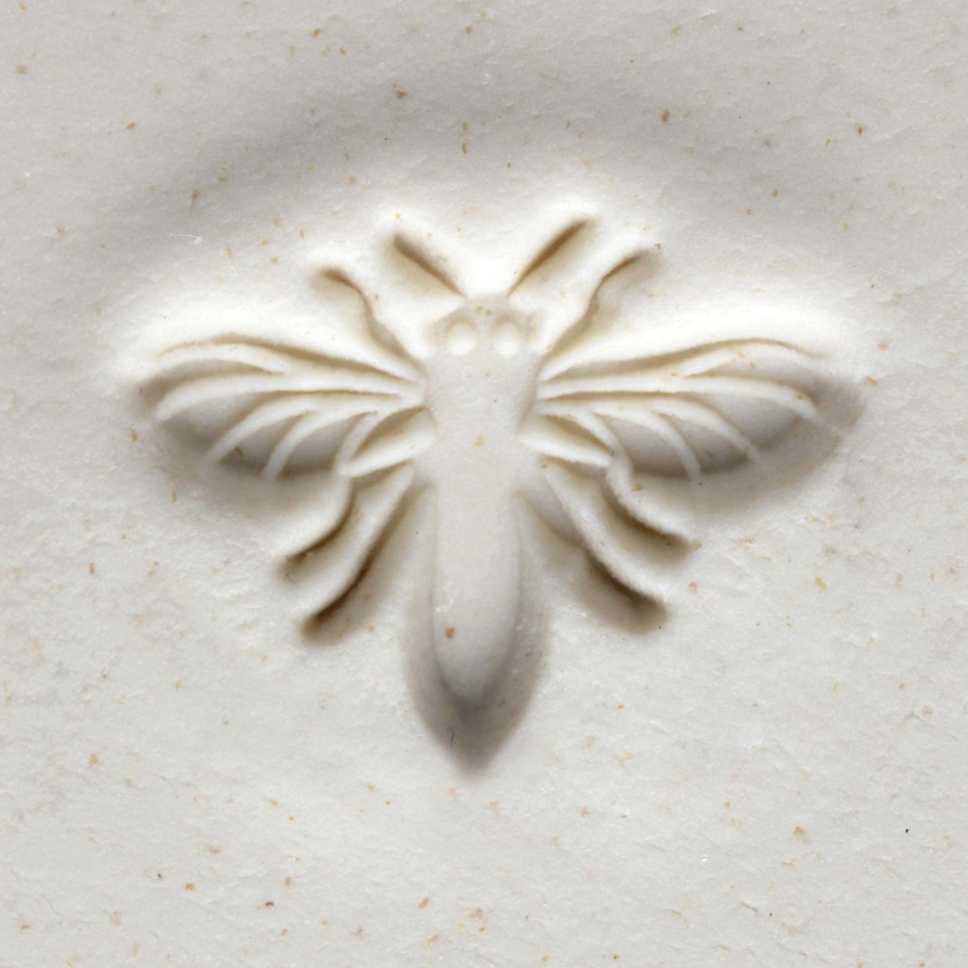 MKM Pottery Tools Medium Round Stamp - SCM-159, Honey Bee applied to clay
