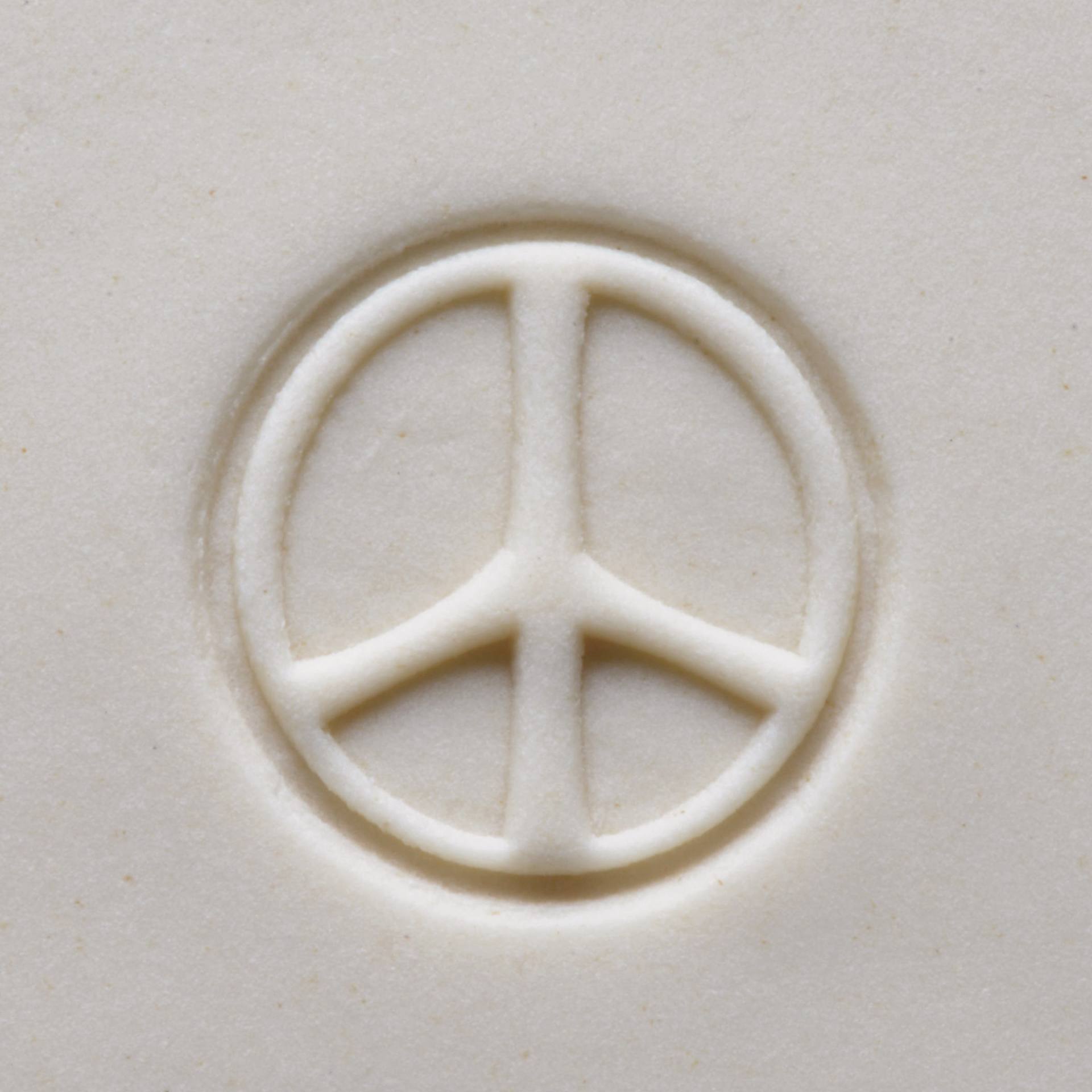 MKM Pottery Tools Medium Round Stamp - SCM-238, Peace Sign applied to clay