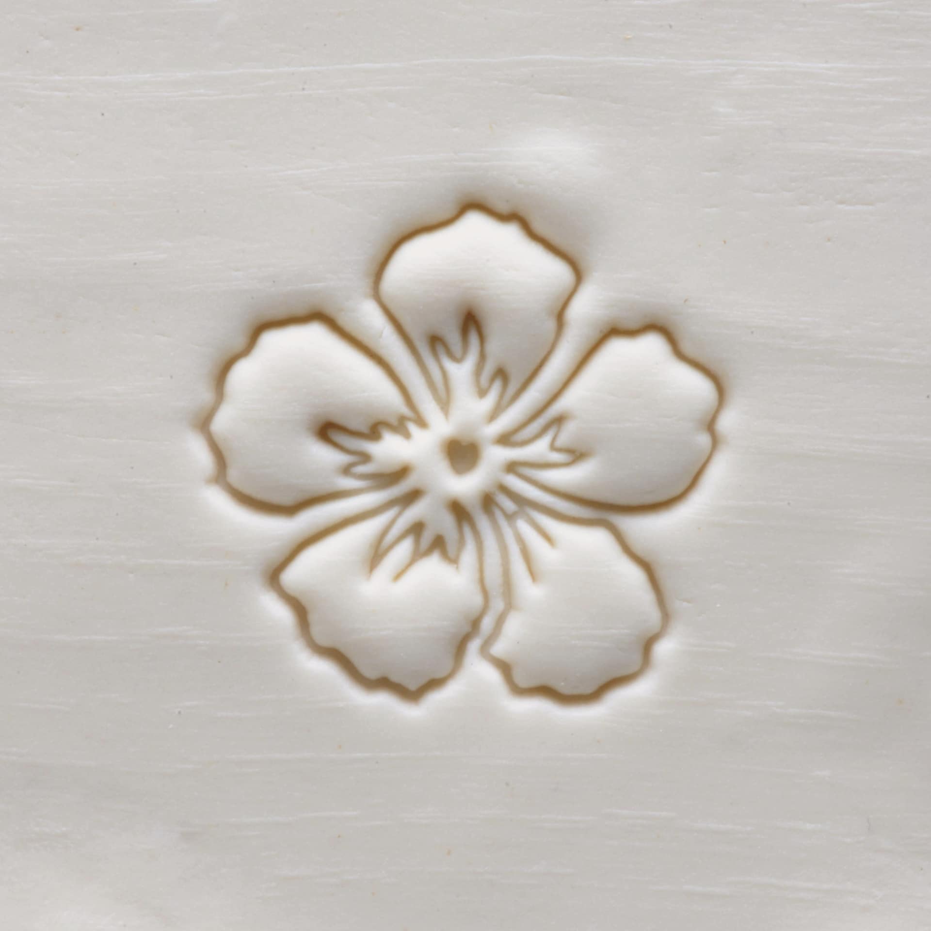 MKM Pottery Tools Large Round Stamp - SCS-120, Hibiscus Flower applied to clay