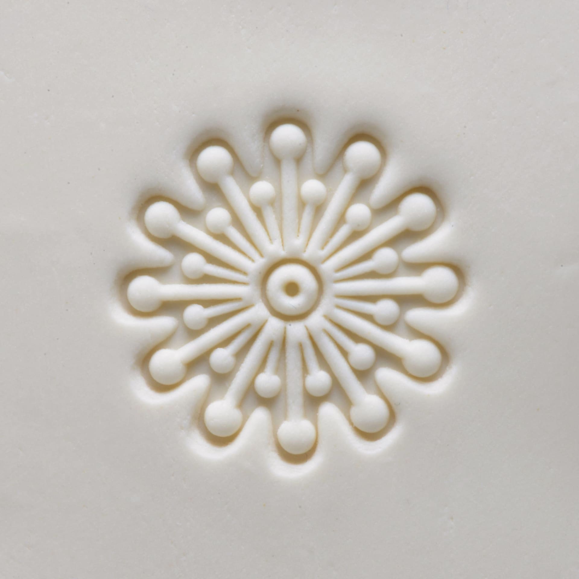 MKM Pottery Tools Large Round Stamp - SCL-121, Supernova applied to clay