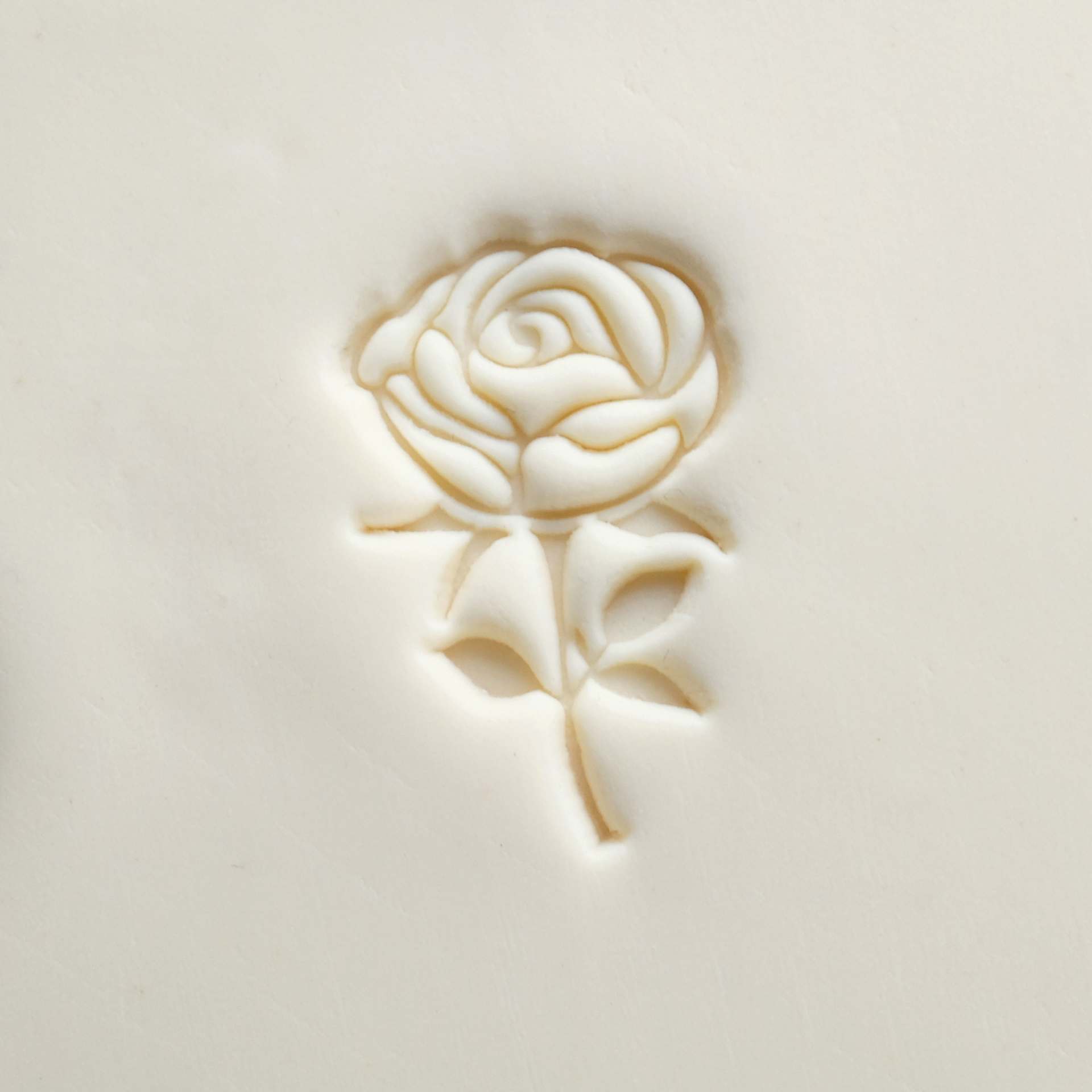 MKM Pottery Tools Large Round Stamp - SCL-164, Rose with Stem applied to clay