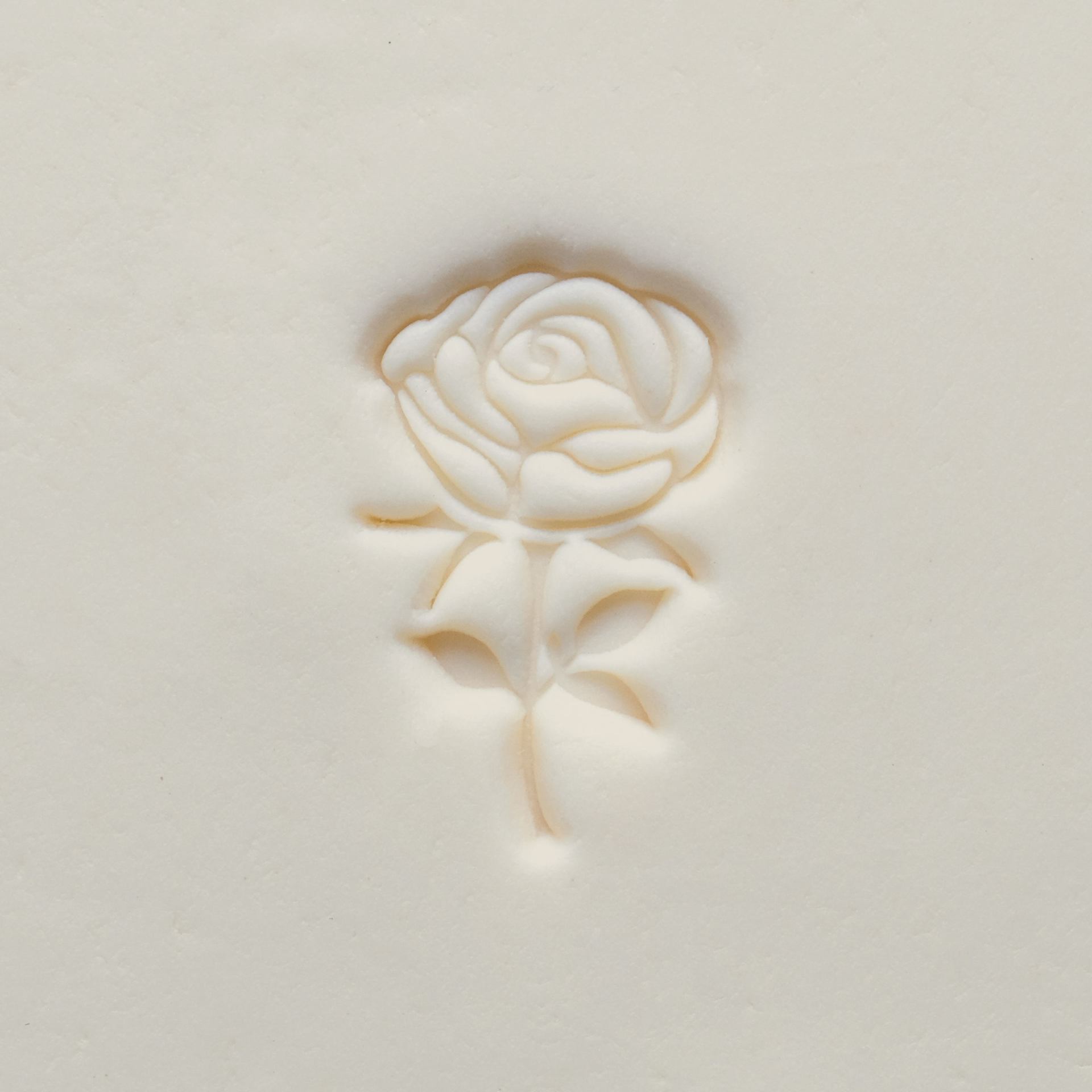 MKM Pottery Tools Medium Round Stamp - SCM-301, Rose with Stem applied to clay