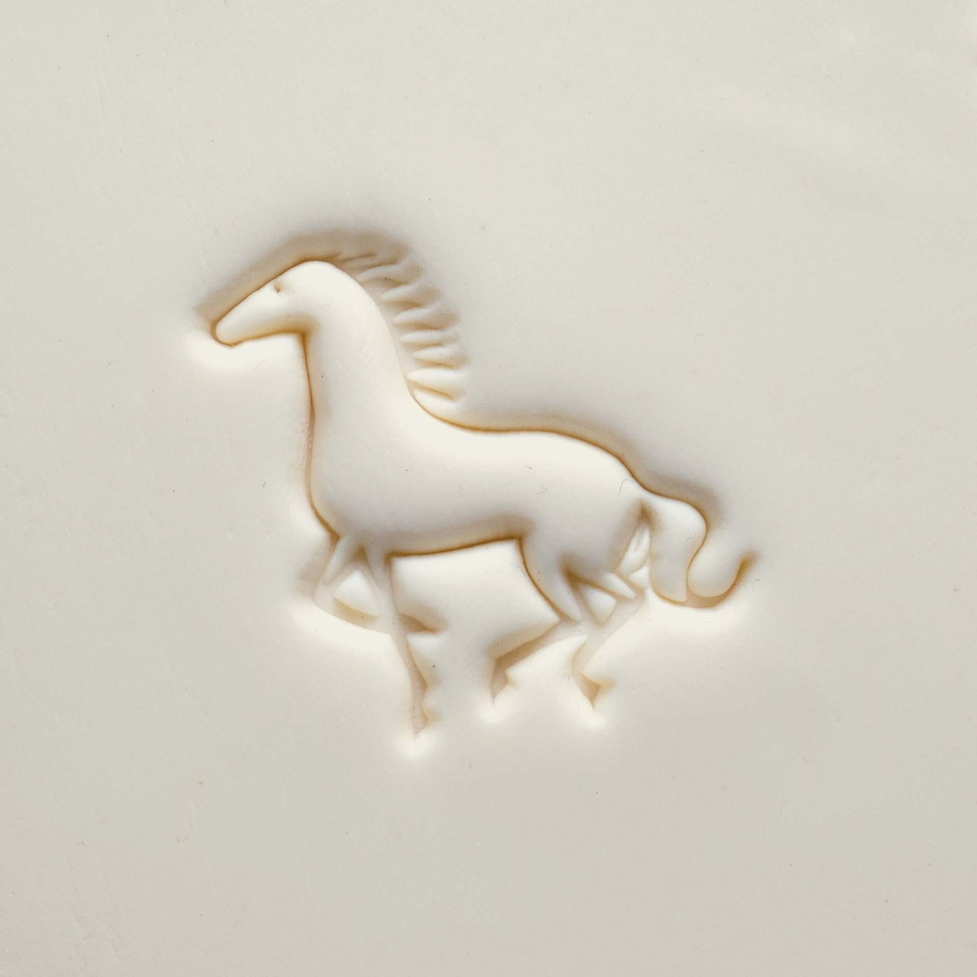 MKM Pottery Tools Large Round Stamp - SCL-171, Running Horse applied to clay