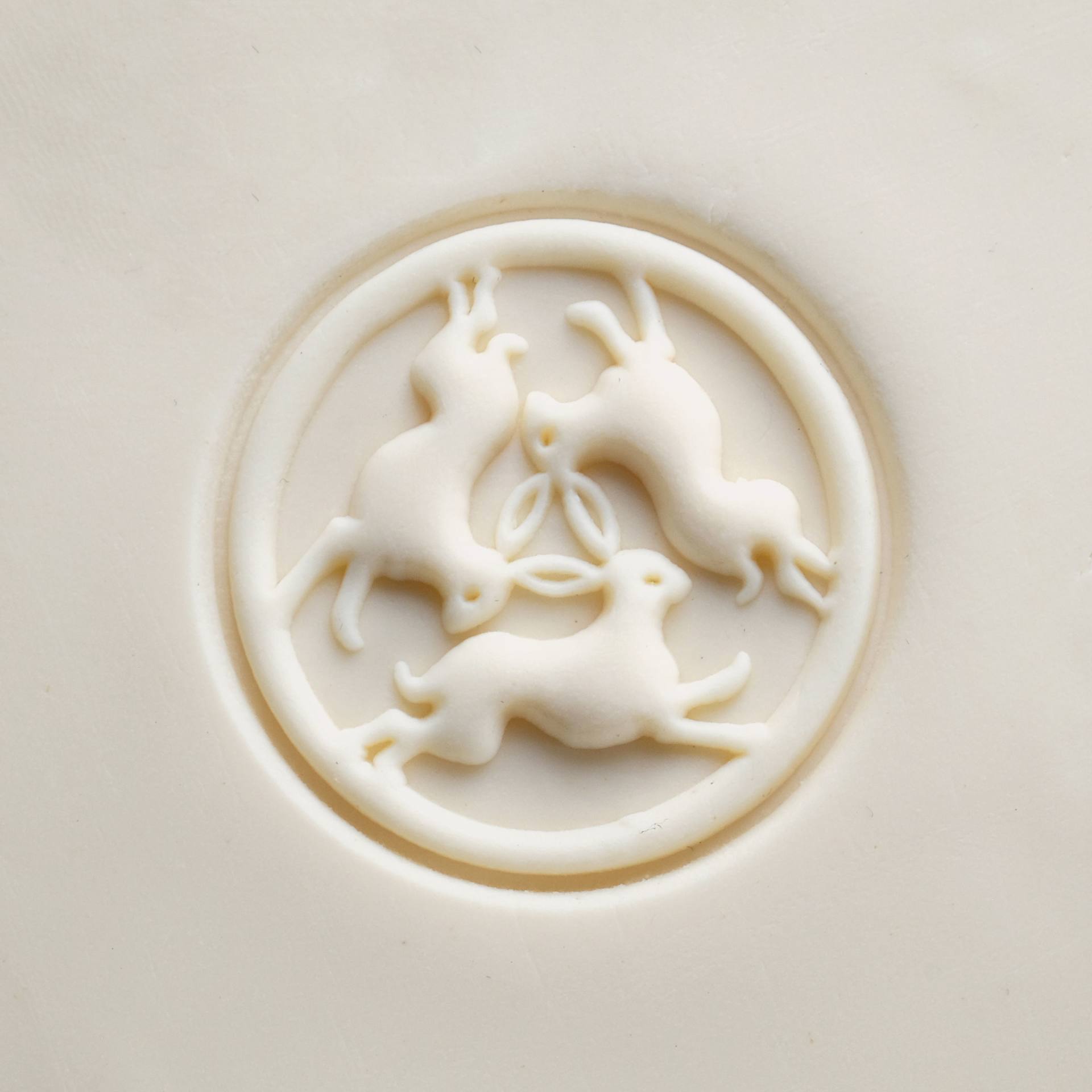 MKM Pottery Tools Large Round Stamp - SCL-174, Three Hares applied to clay
