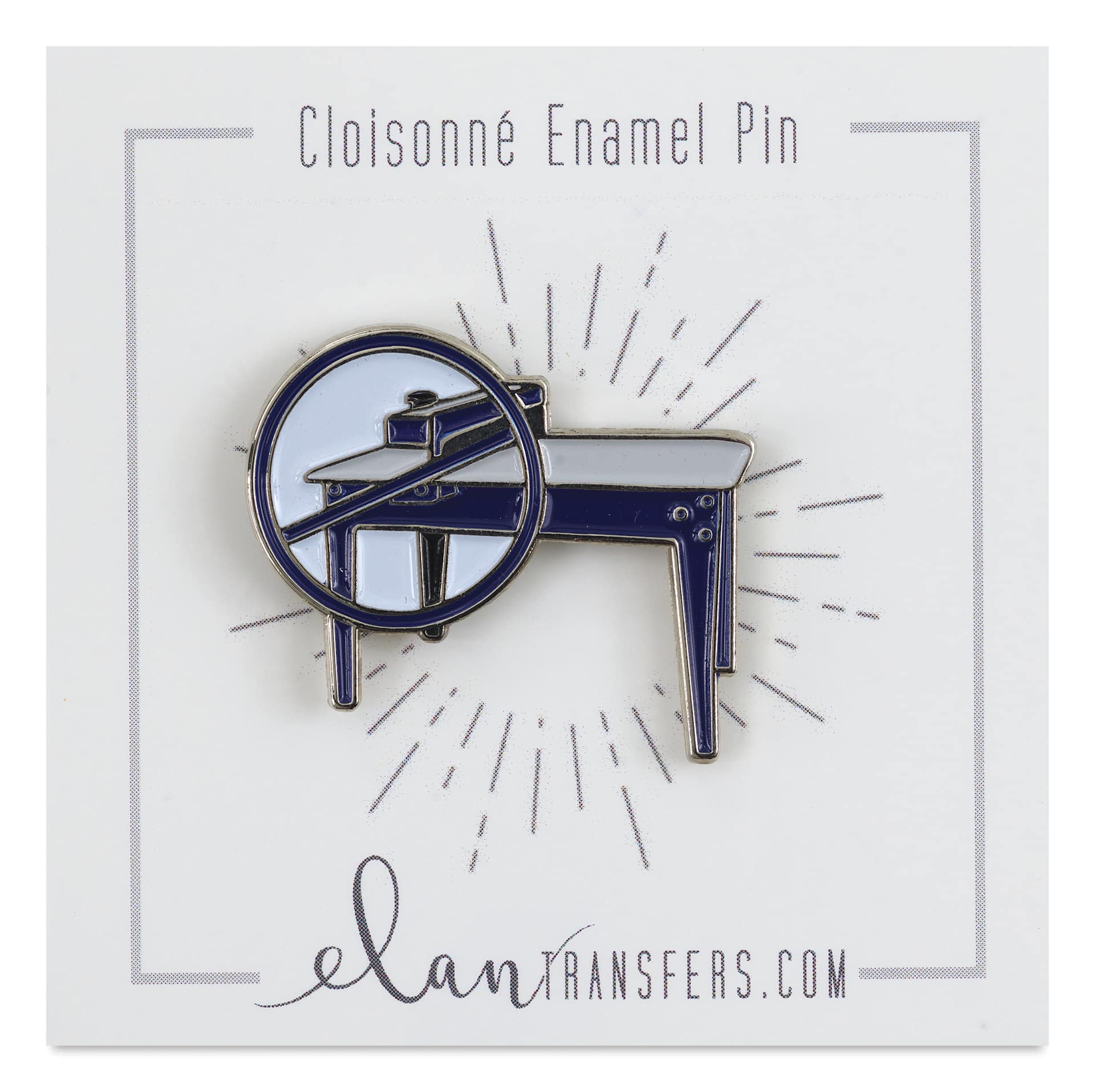 Elan Transfers Enamel Pin - Slab Roller Blue pinned to front of packaging