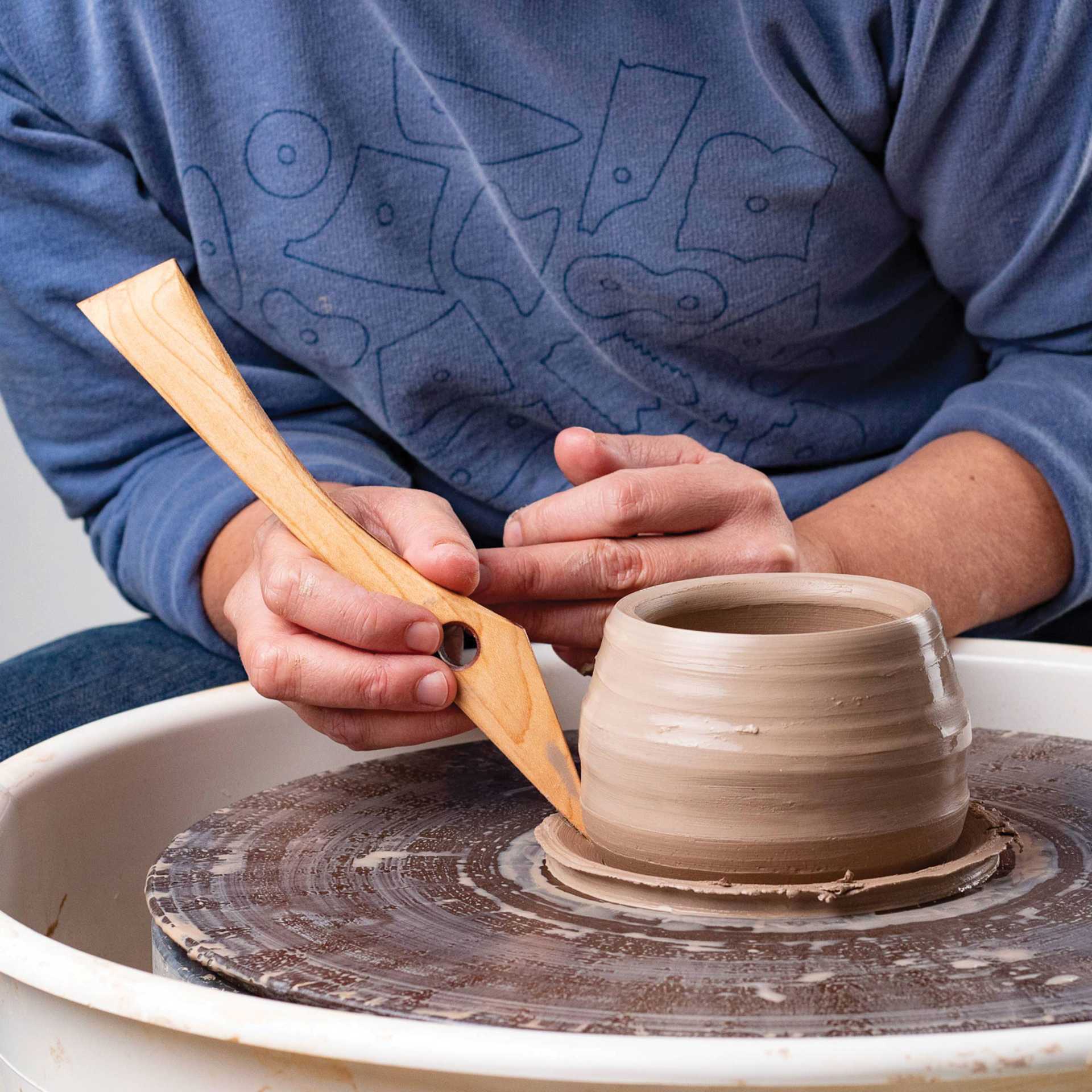 Garrity Tools Wooden Knife Tool - in use on a pottery wheel