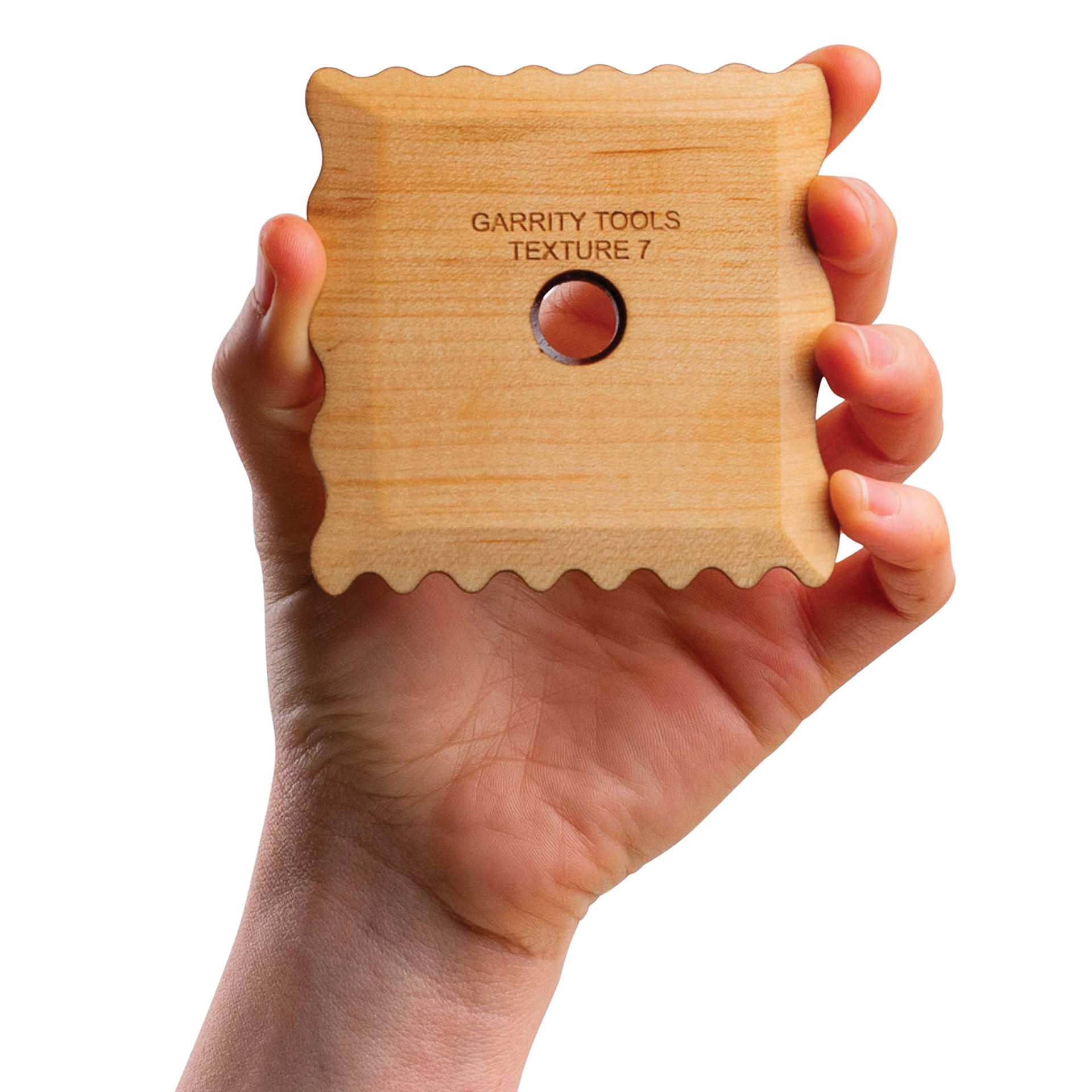 Garrity Tools Wood Texture Rib - Texture 7, in a hand