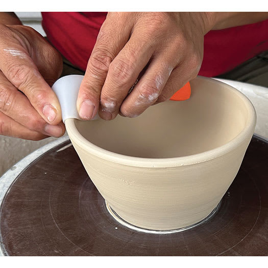Xiem Silicone Clay Slicker smoothing edges of project