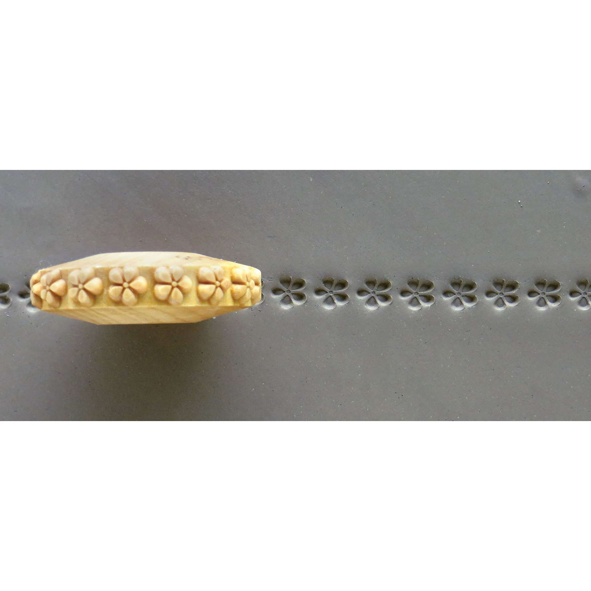 MKM Pottery Tools Finger Roller - Daisy applied to clay