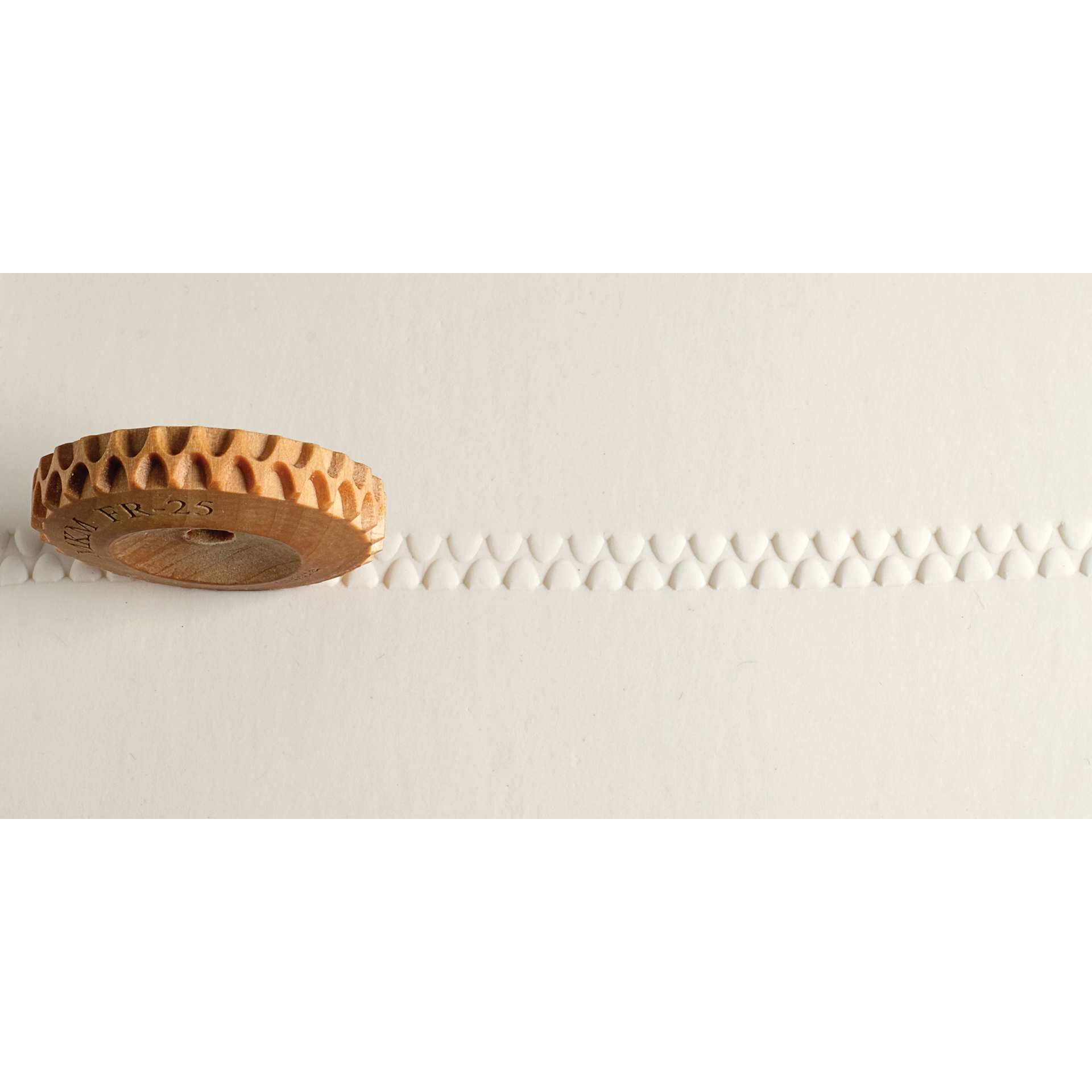 MKM Pottery Tools Finger Roller - Bike Tread applied to clay