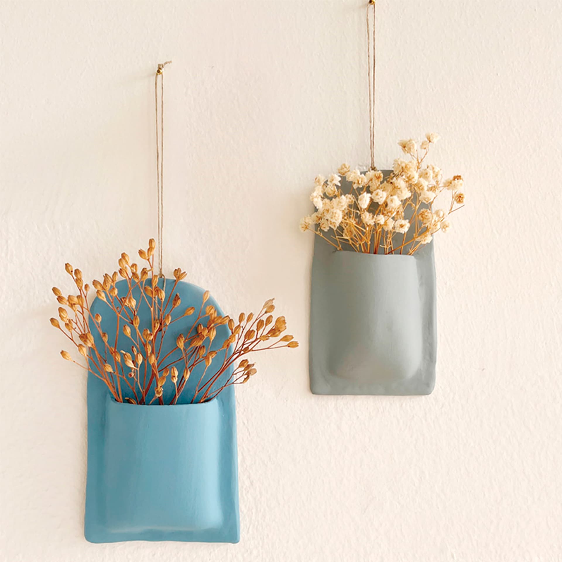 Sio-2 Plus Clay - 2.2 lb, Terra Cotta - finished sprig holder examples hanging on wall