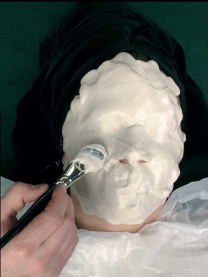 Moulage and Posmoulage Materials - Face entirely covered in material
