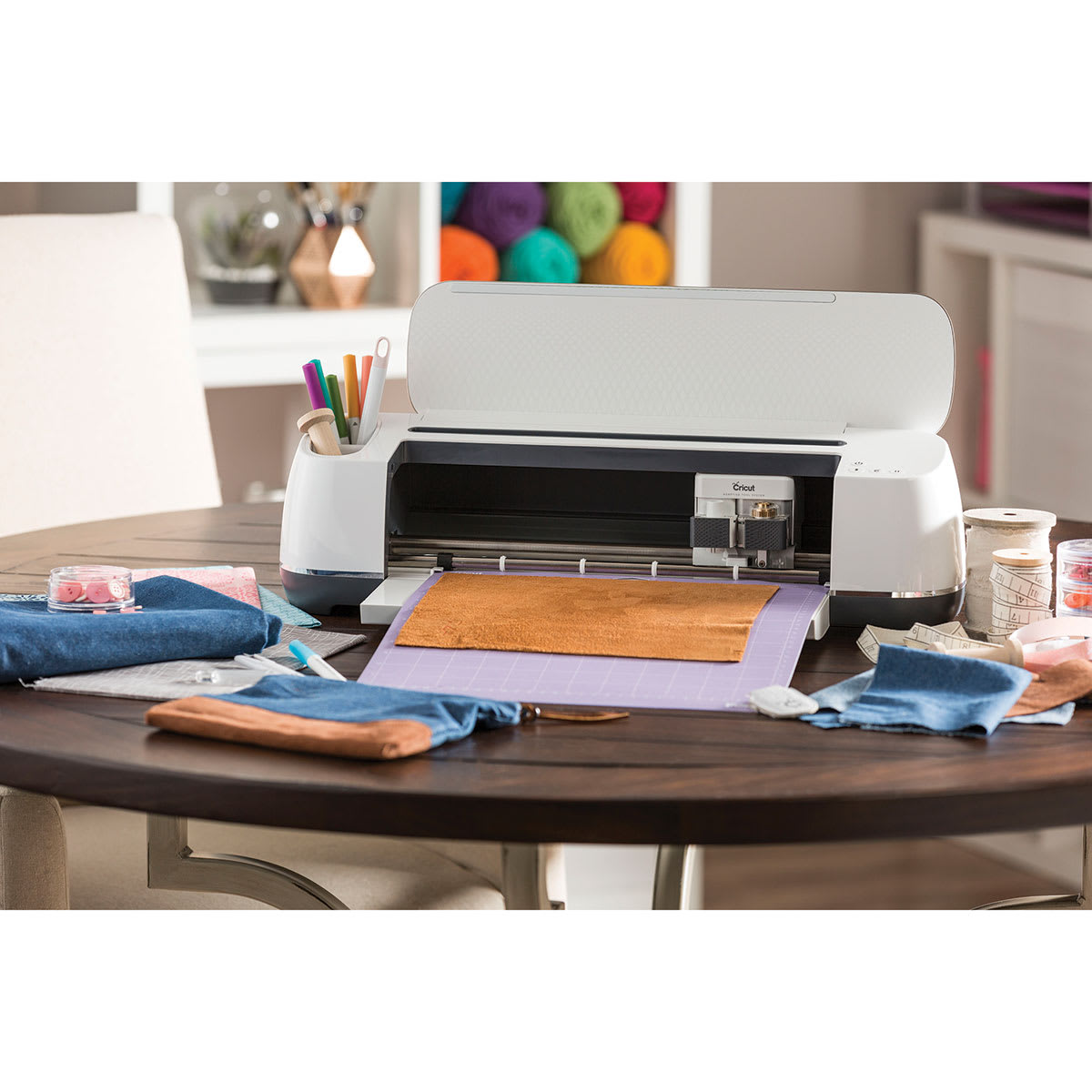 Cricut Maker shown with printing materials 