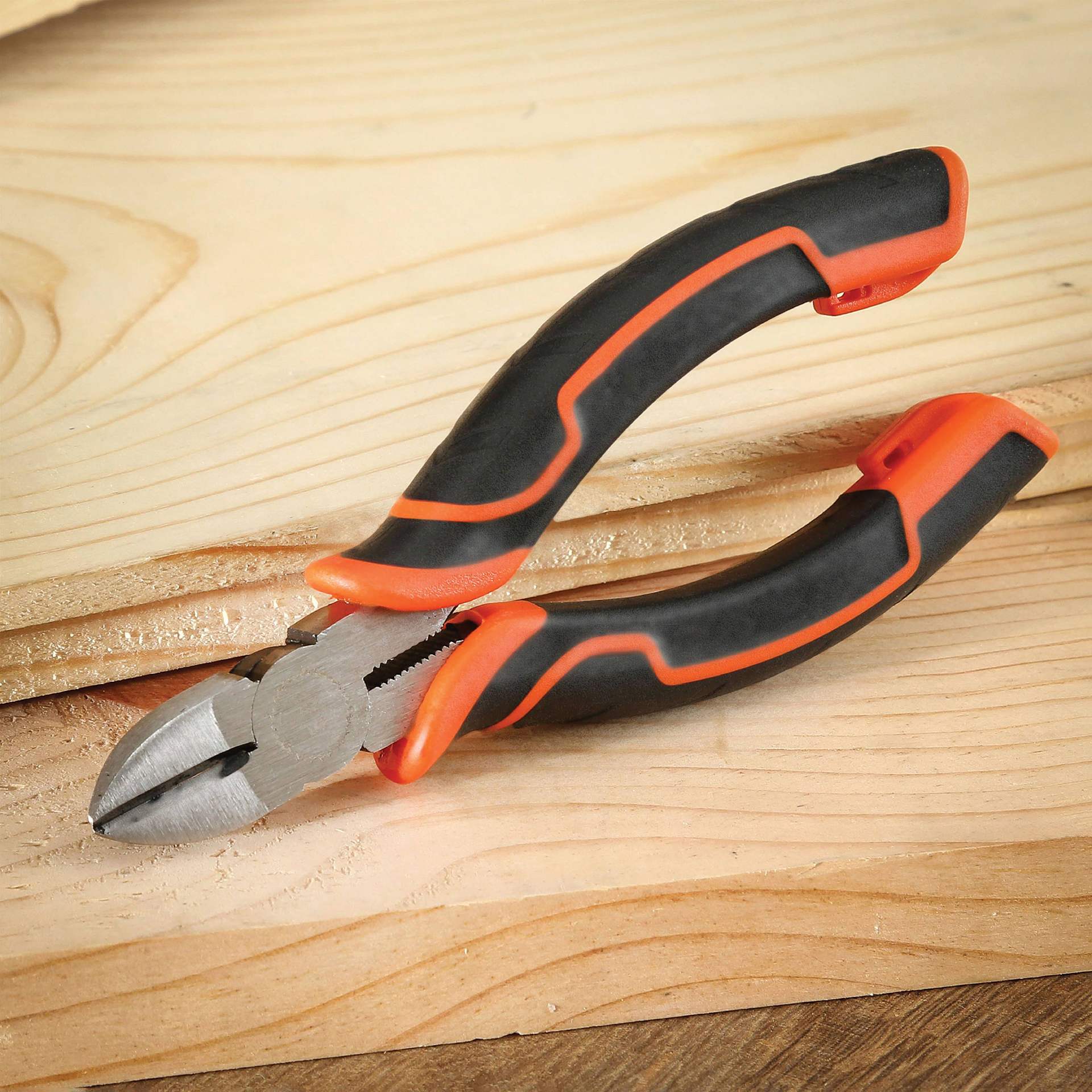 GreatNeck Diagonal Pliers - 5-1/2" - close-up of pliers lying on board