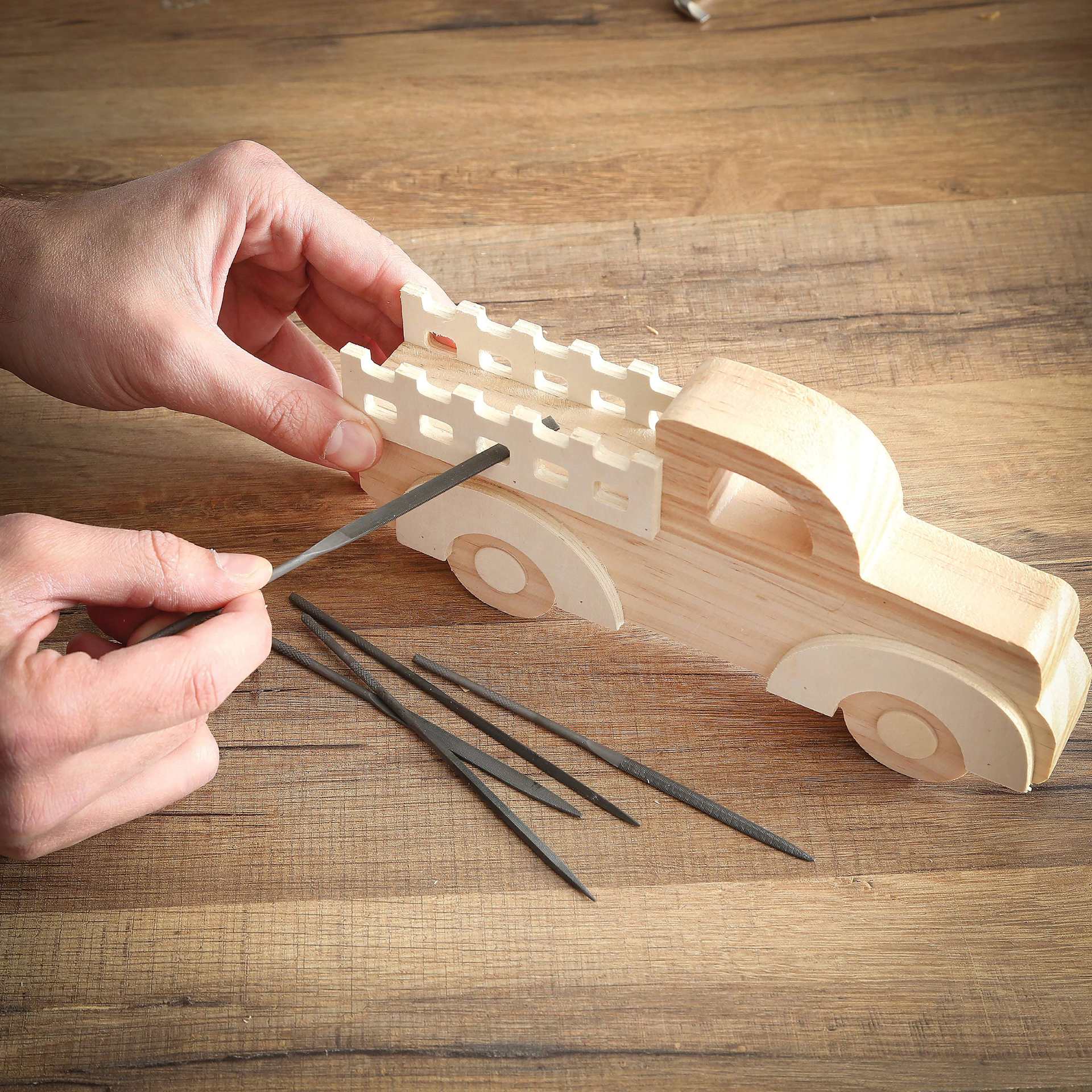 GreatNeck Needle Files - Set of 6 - in use to file toy truck