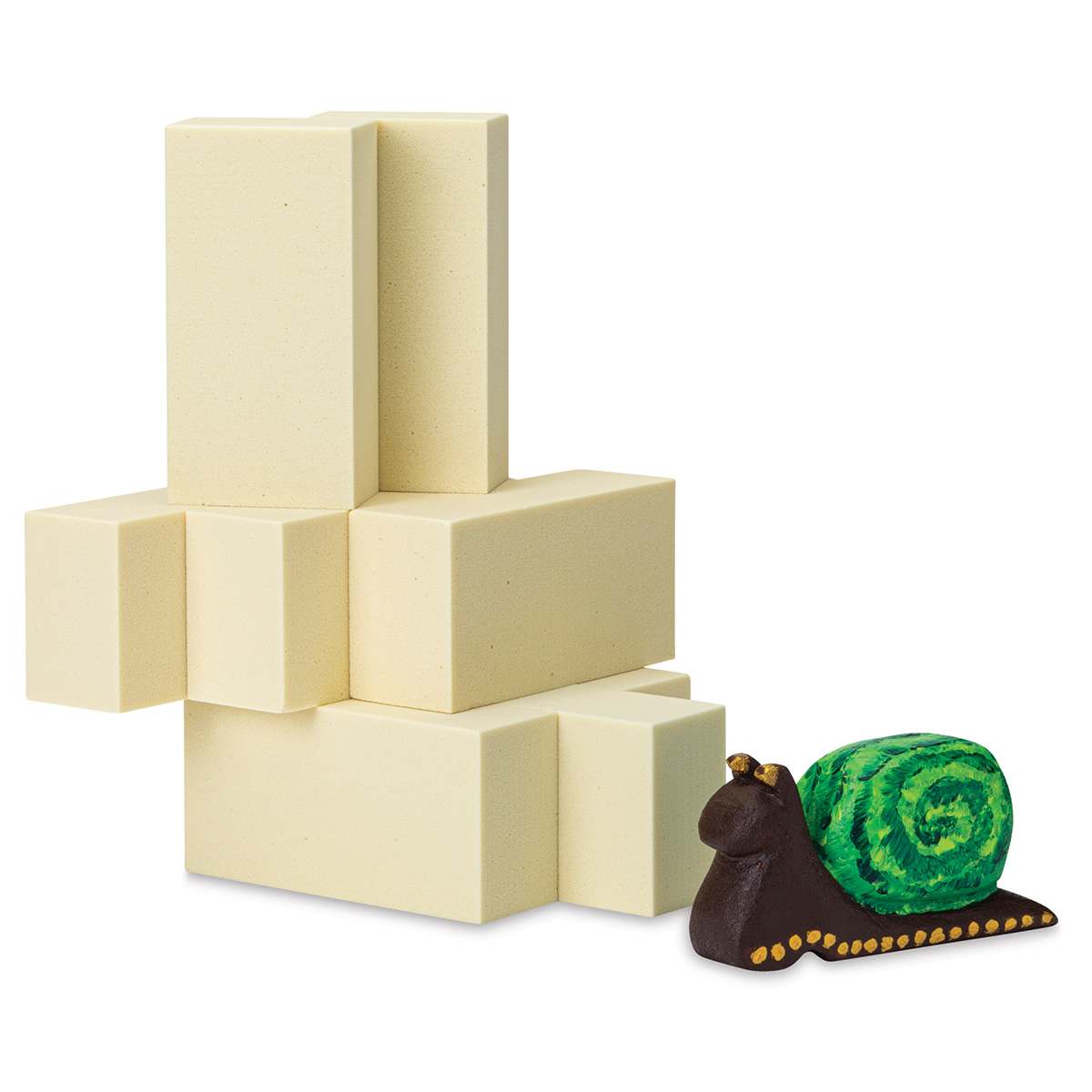 Blick Carving Foam, Stack of 6" x 3" x 2" blocks with finished Snail Art