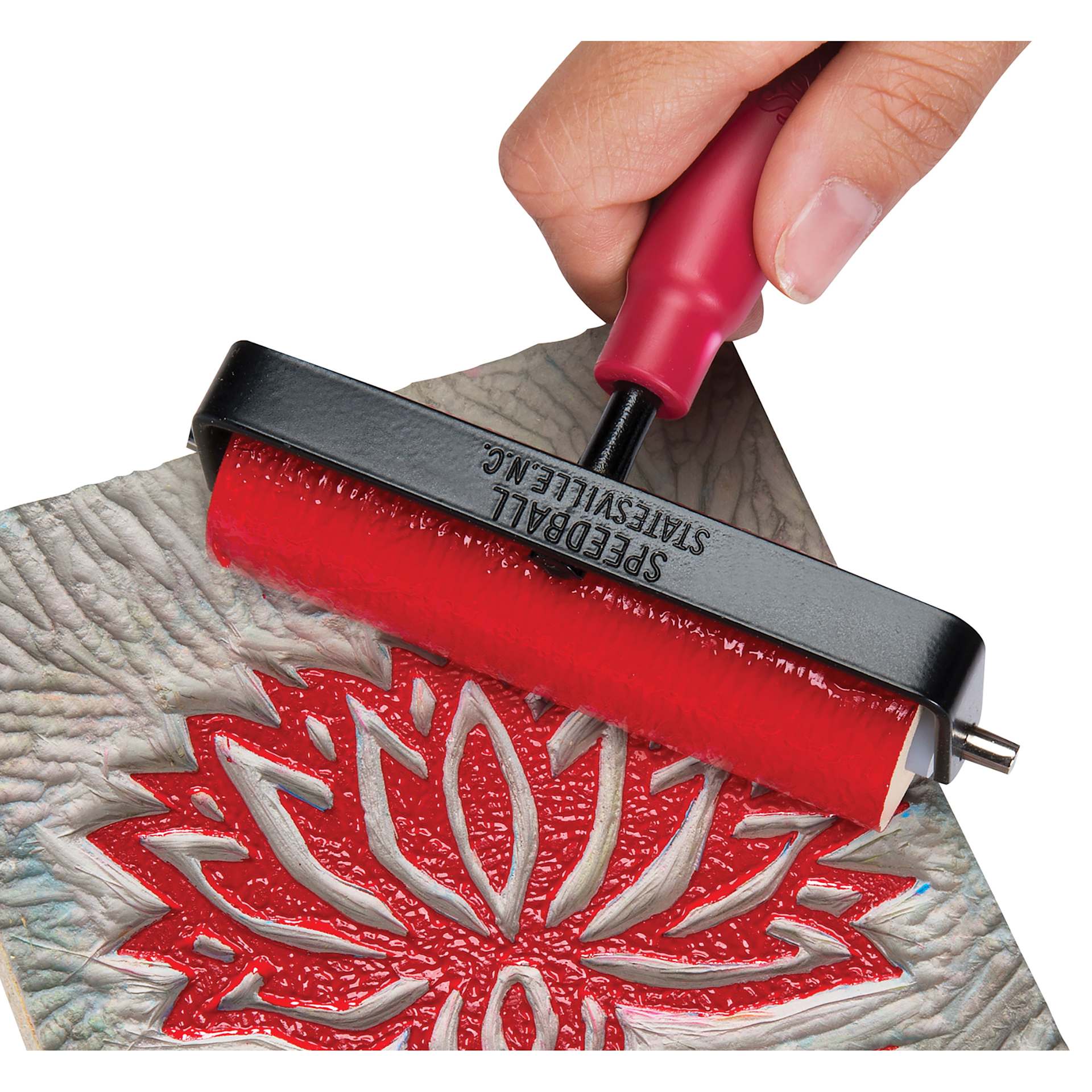 Speedball Red Baron Mounted Linoleum Blocks having ink applied by brayer