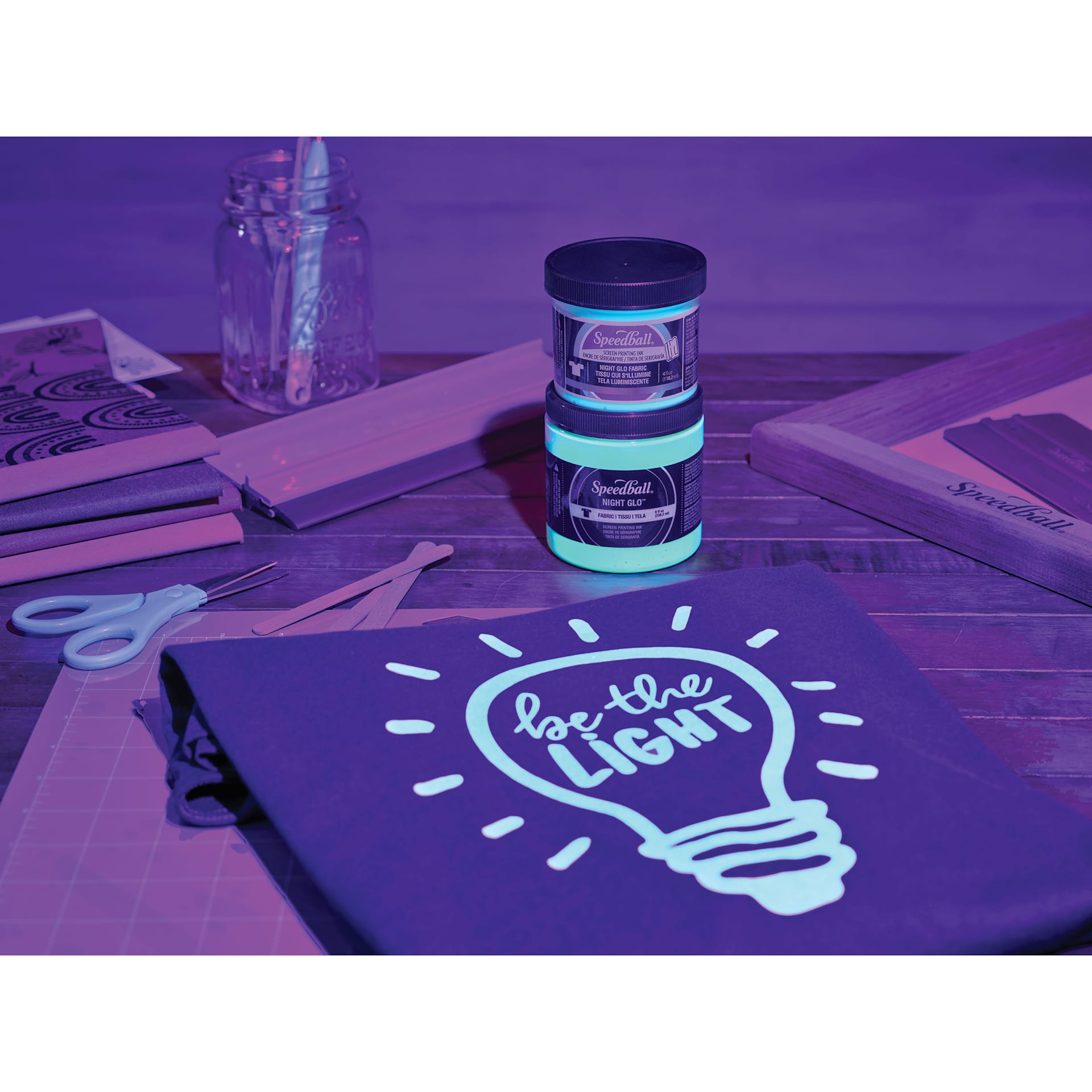 Speedball Night Glo Fabric Screen Printing Inks with painted shirt, glowing in the dark