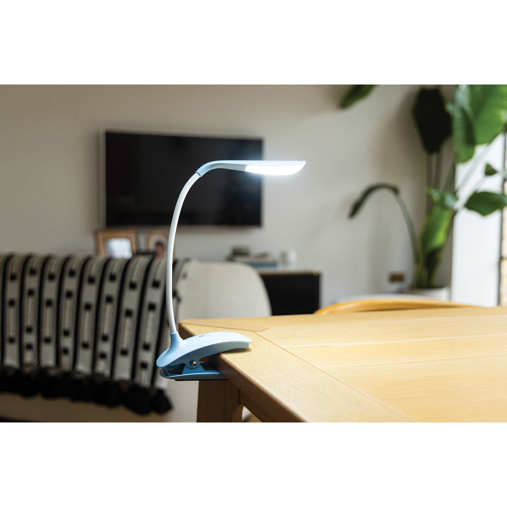 Daylight Smart Clip-On Lamp - Blue, attached to table