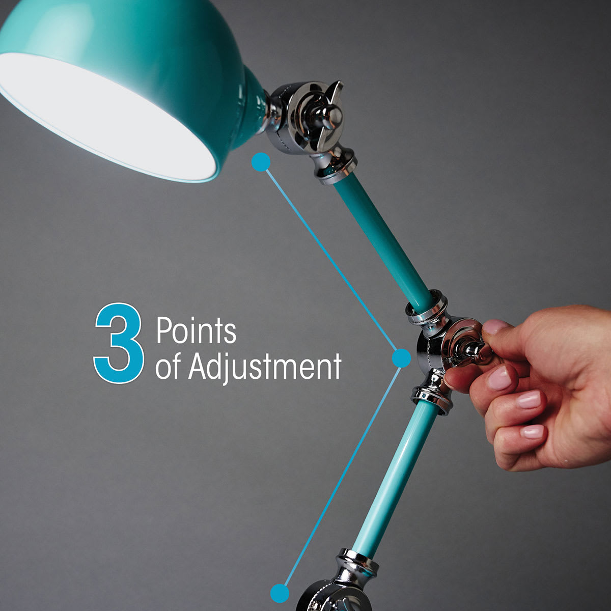 OttLite LED Revive Table Lamps - Photo showing hand adjusting angle of lamp OttLite LED Revive Table Lamps - Photo showing hand adjusting angle of lamp