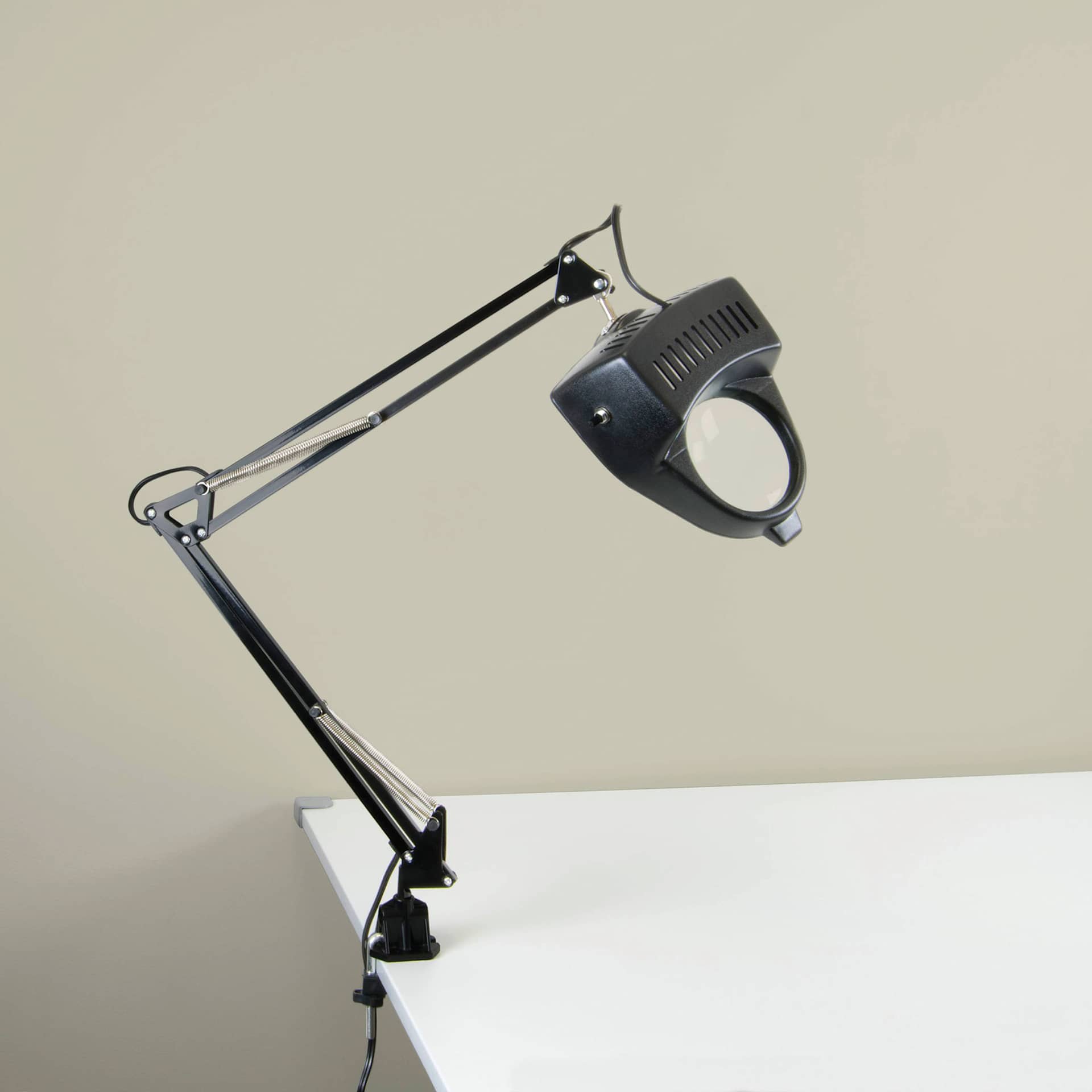 Studio Designs Magnifier Lamp - Black, Diopter 3, clamped to a table