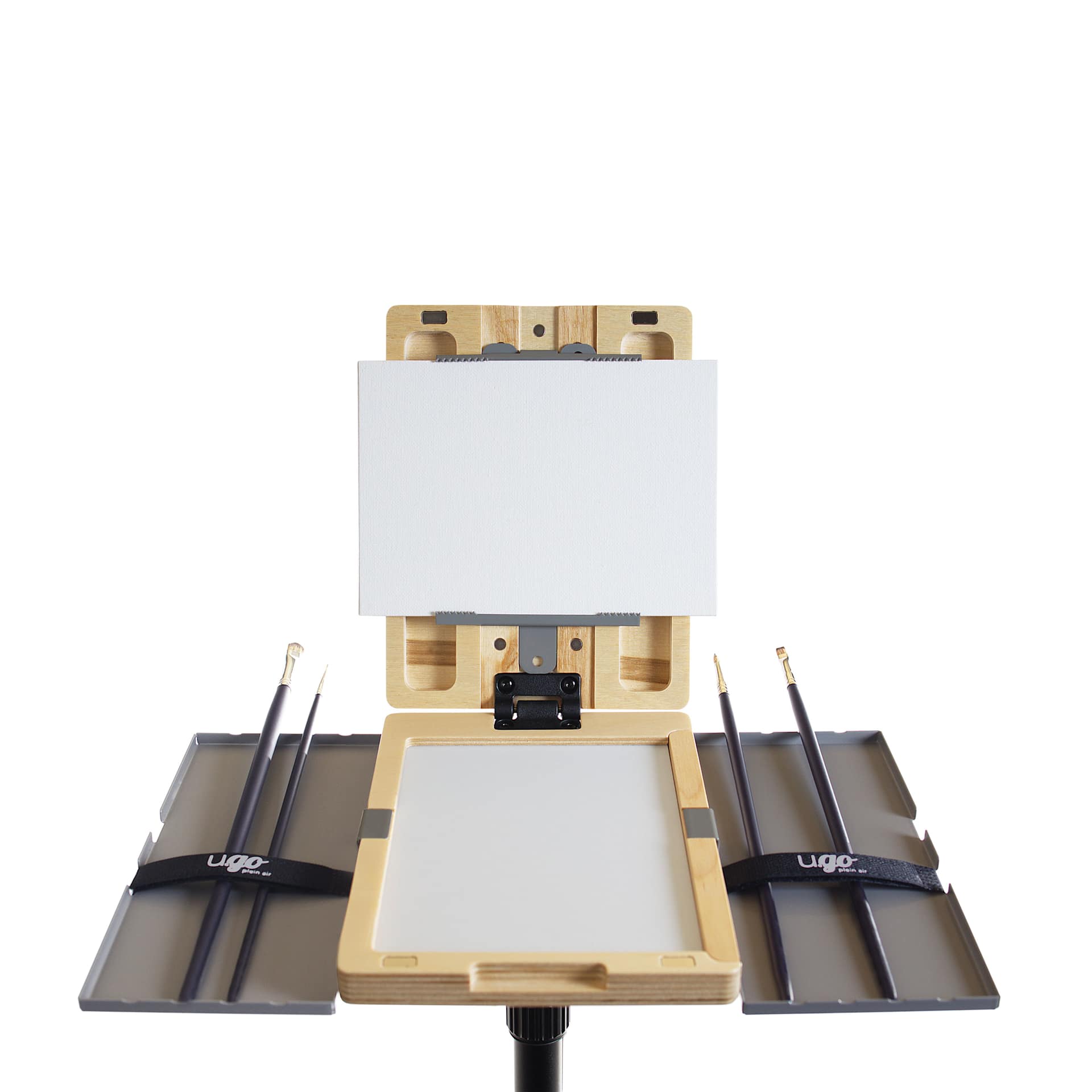 New Wave u.go Plein Air Anywhere Metal Side Tray - 4" x 8" - attached to a u.go Plein Air Anywhere Pochade while holding brushes (brushes, canvas, and pochade sold separately)