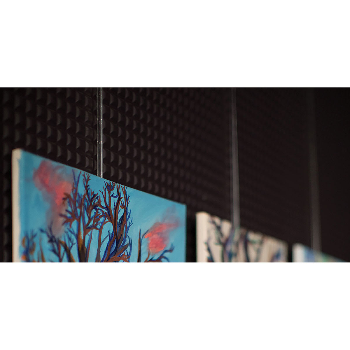 Walker System Plain Rod - Clear Acrylic, 72" - in use to hold up art on panel