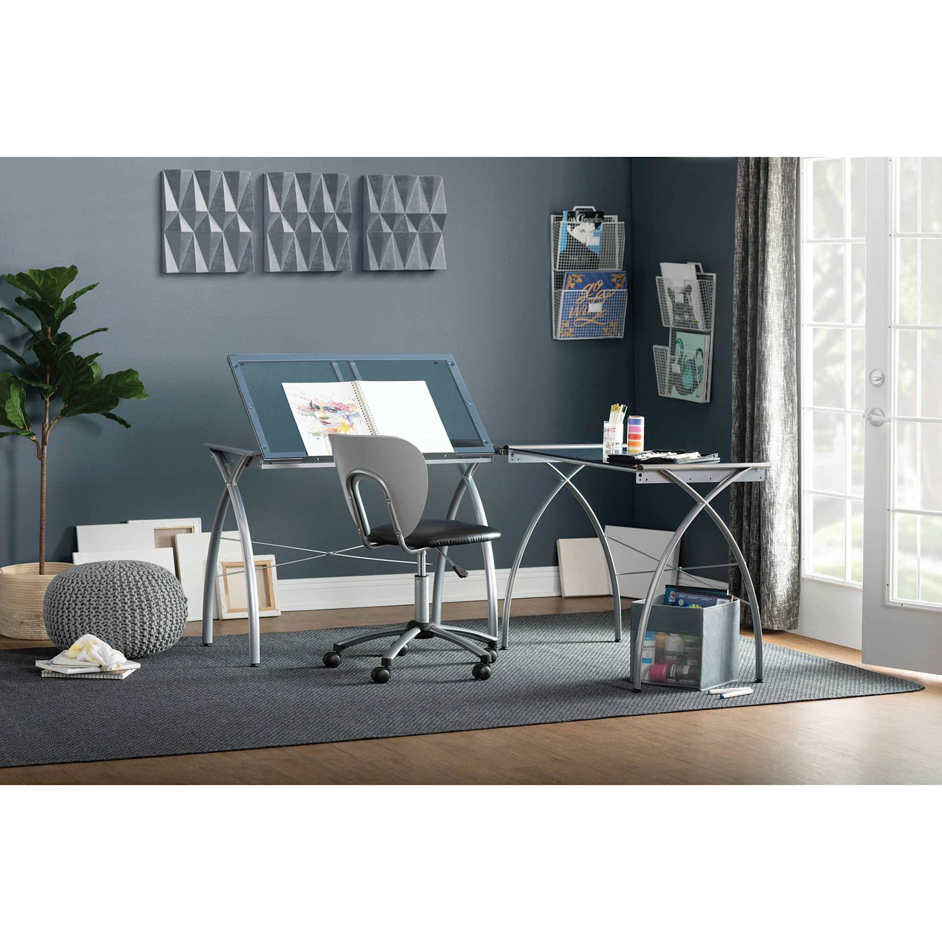 Studio Designs Futura LS Workcenter, stationed inside of room