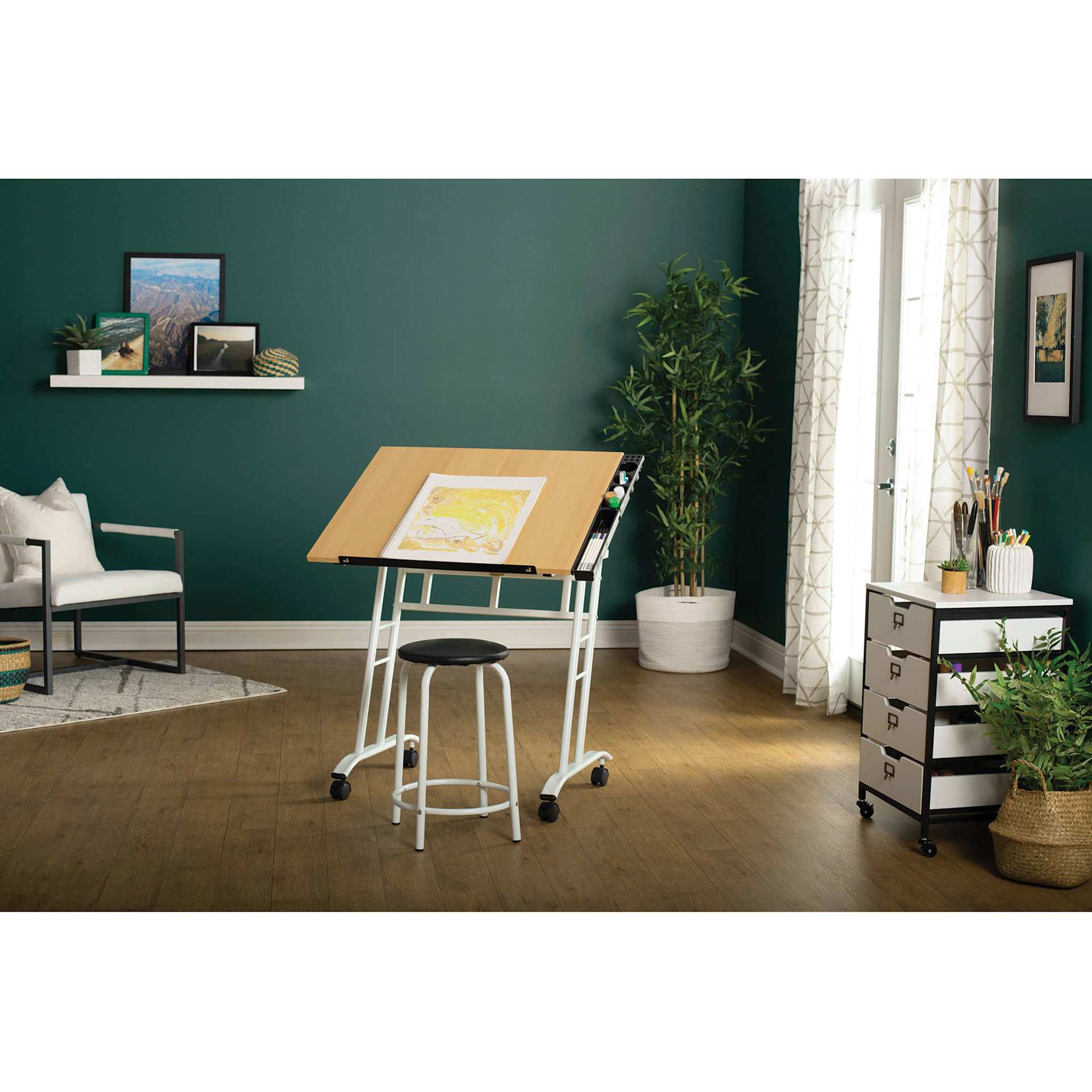 Studio Designs Craft Center Set, stationed inside a room with supplies on top of the table Studio Designs Craft Center Set, stationed inside a room with supplies on top of the table