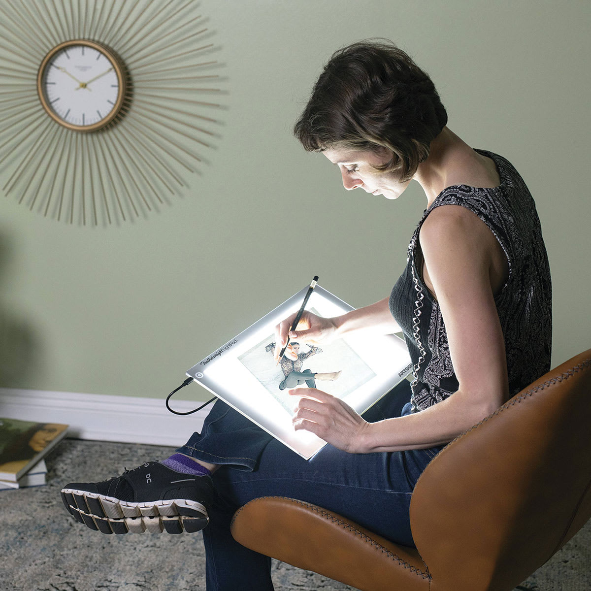 Artograph Featherweight LightPad - 9" x 12" (Person using LightPad to trace image)