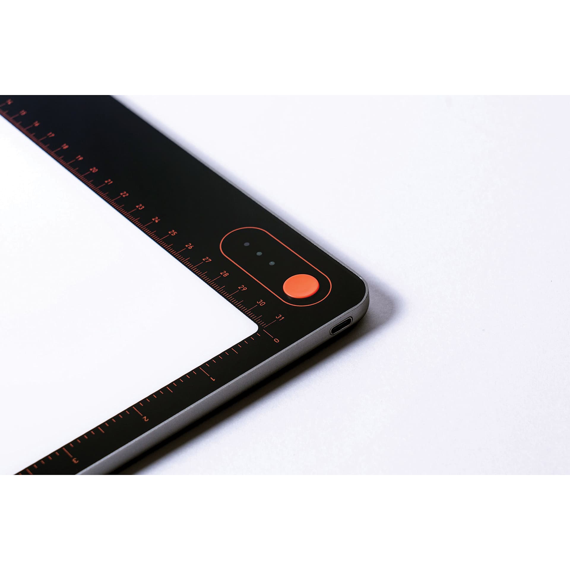 Daylight Tabla Go Rechargeable Light Pad - corner with dimmer button
