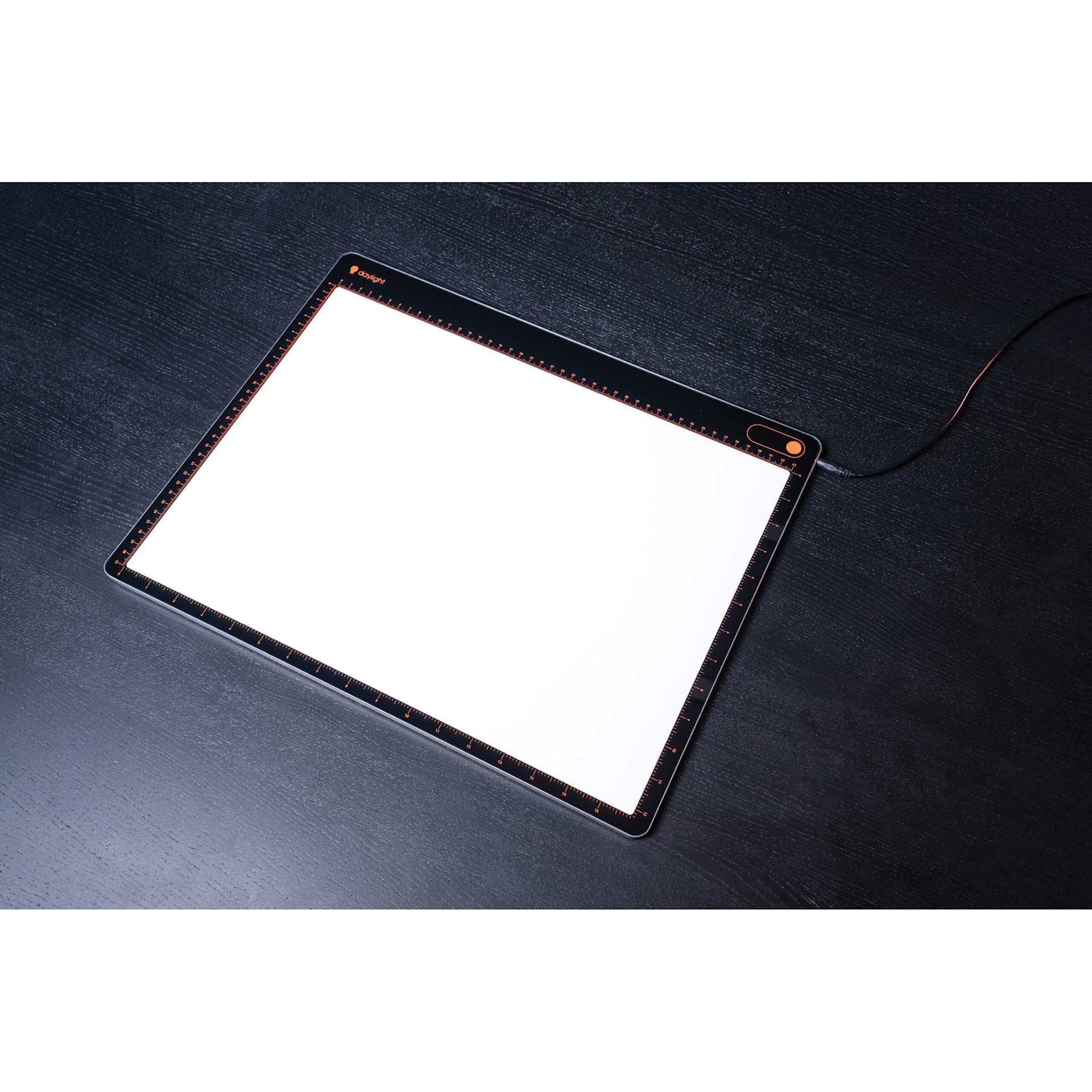 Daylight Tabla XL Light Pad, on table