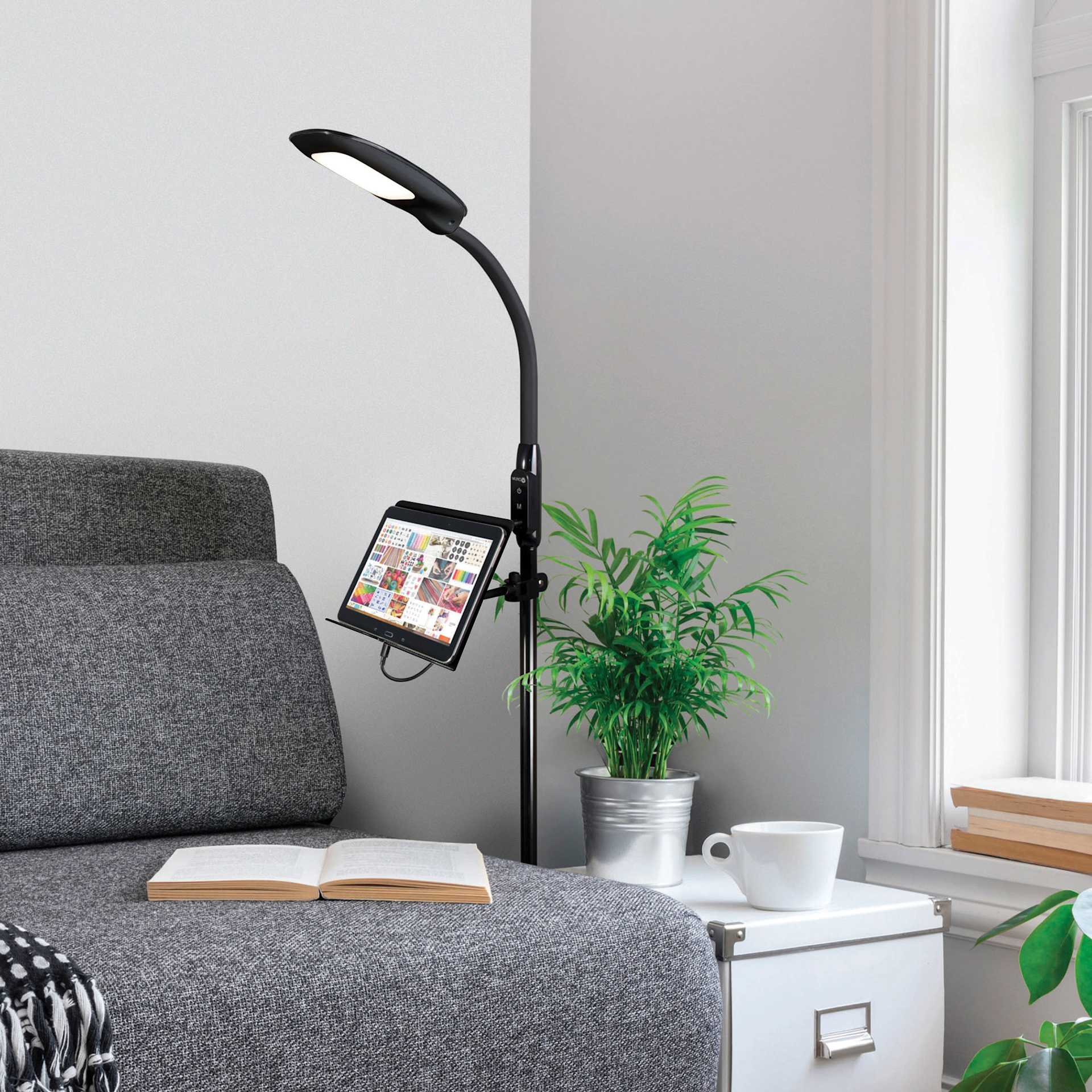 OttLite LED Floor Lamp with USB and Tablet Stand - Black, with a tablet on the stand