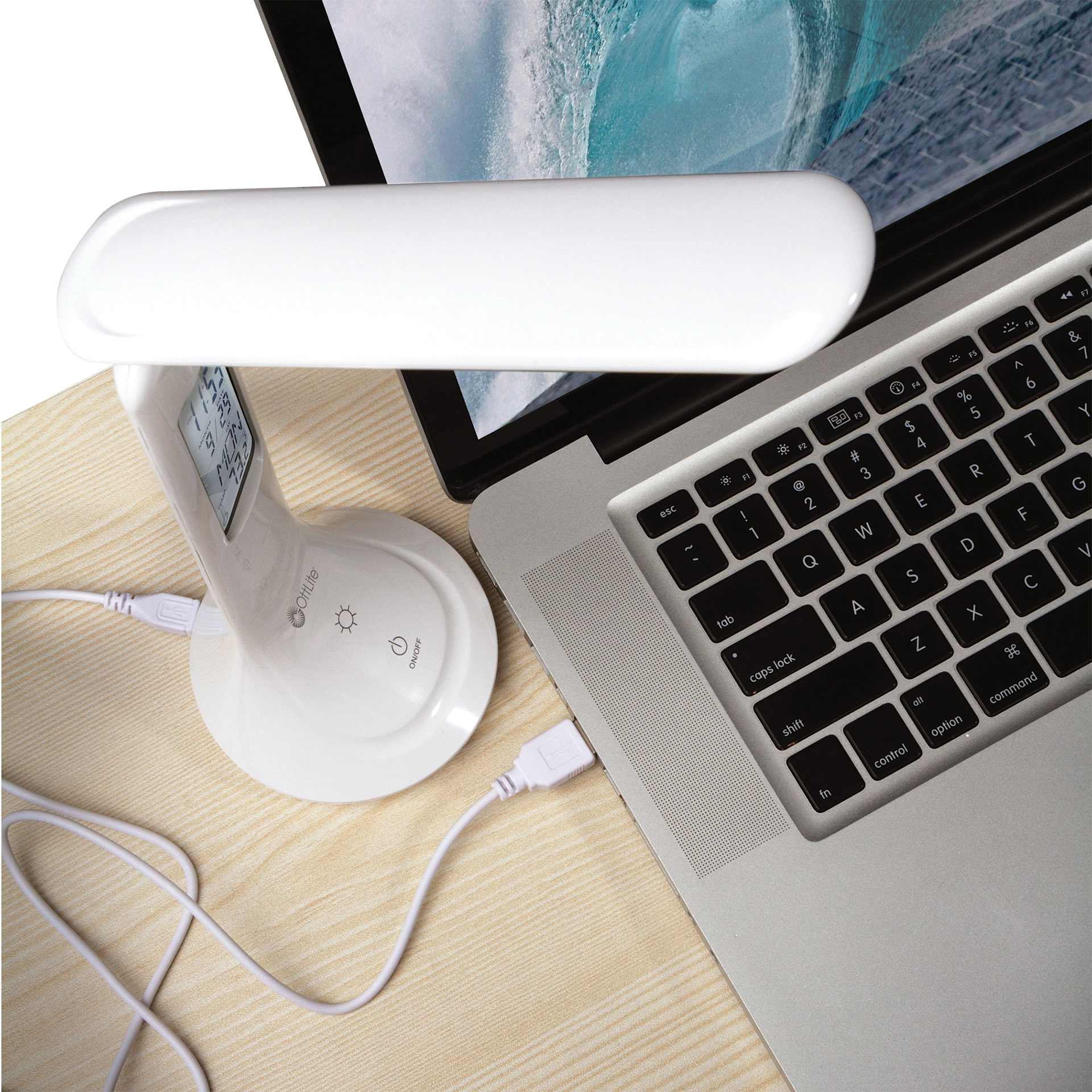 OttLite Travel Rechargeable LED Task Lamp - White, connected to laptop with charging cable