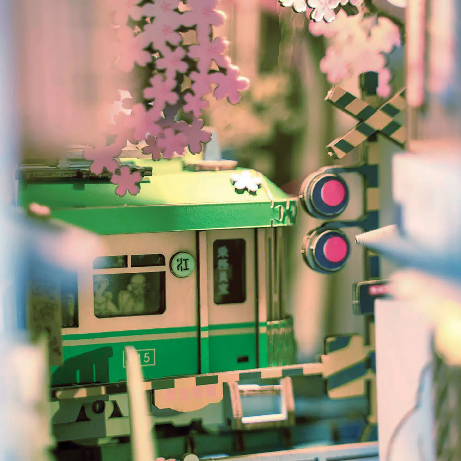 Rolife Sakura Densya DIY Book Nook Kit, close-up of train inside kit