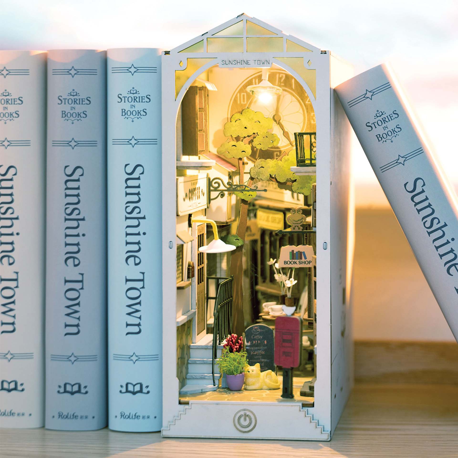 Rolife Sunshine Town DIY Book Nook Kit, constructed kit between books