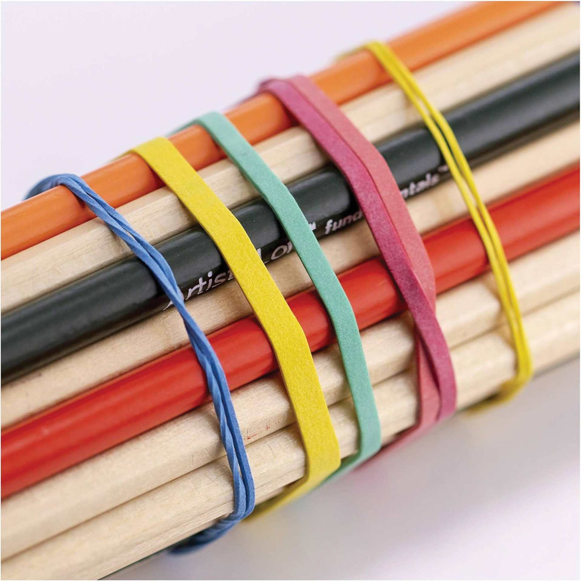 Officemate Rubber Band Ball holding paint brushes together for organization
