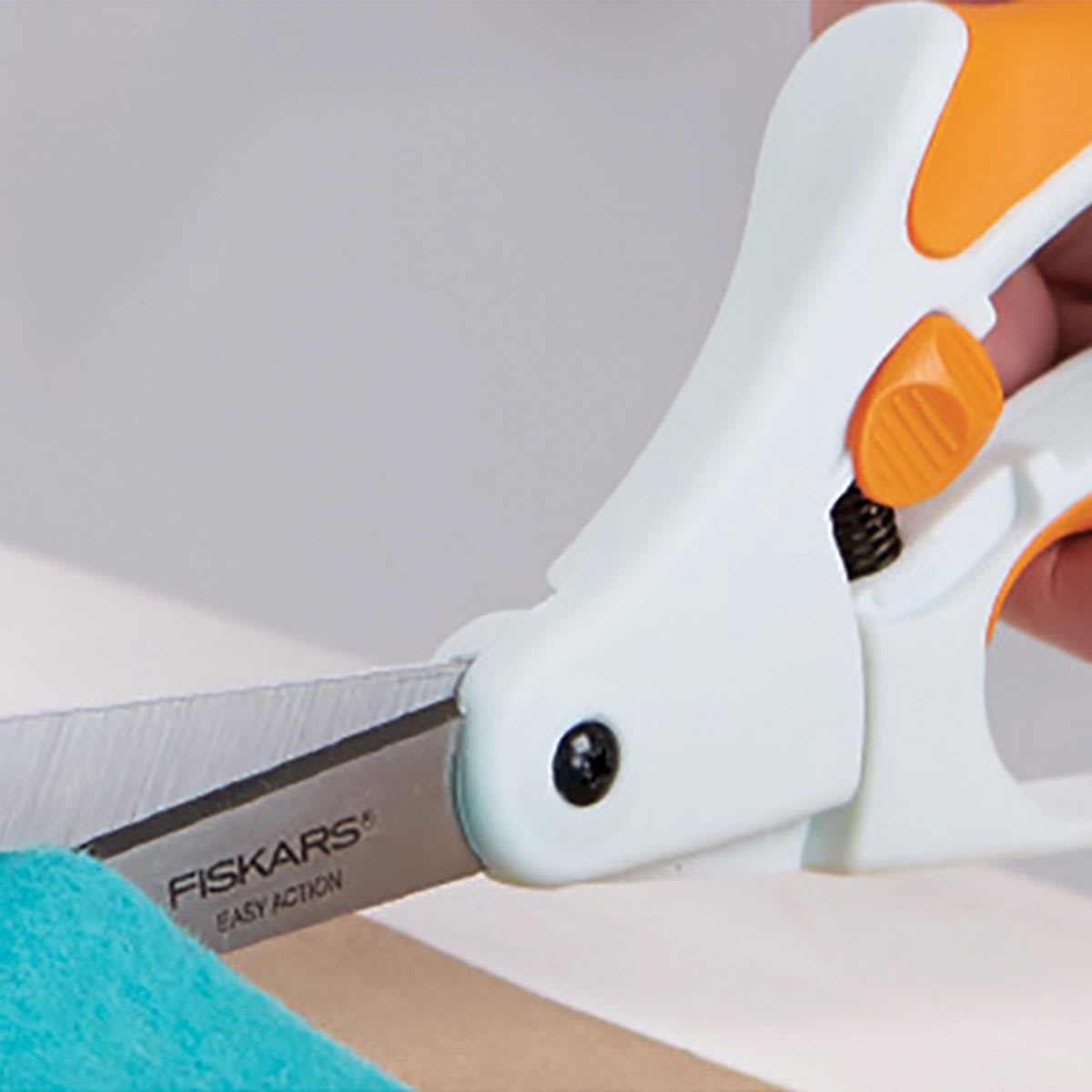 Fiskars Easy Action Scissors - Closeup of scissors cutting felt