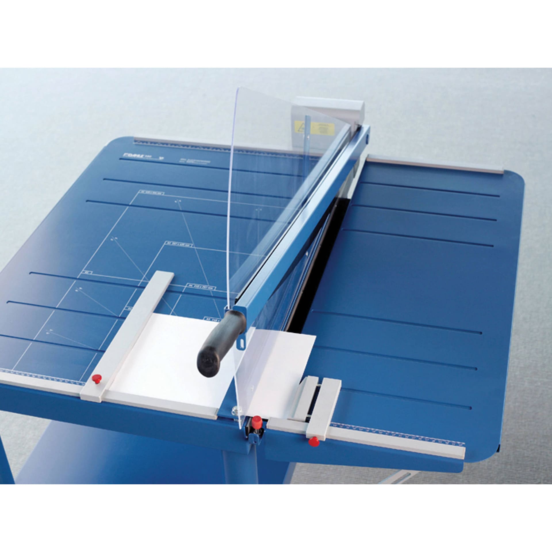 Dahle Large Format Premium Guillotine Trimmer - 32" Cutting Length, paper fed through the trimmer Dahle Large Format Premium Guillotine Trimmer - 32" Cutting Length, paper fed through the trimmer