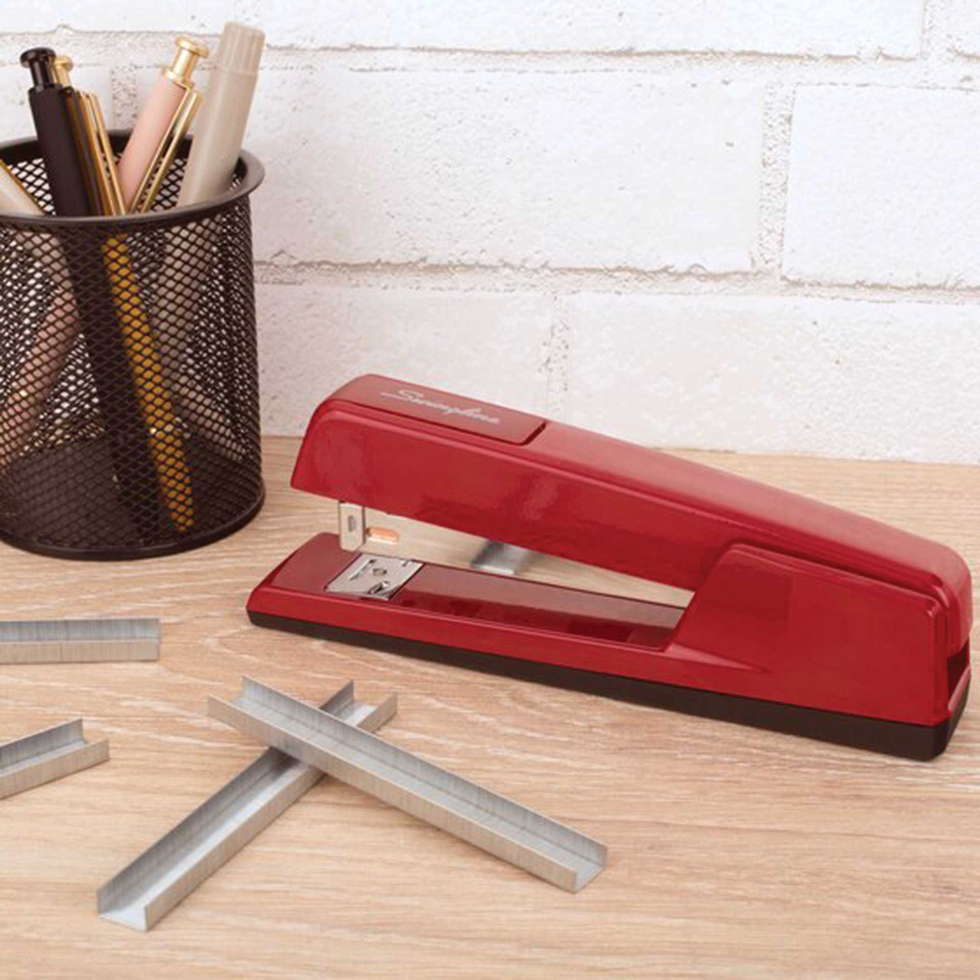 Swingline SF4 Premium Office Staples - 1/4", Box of 5000 sitting beside stapler (sold separately)