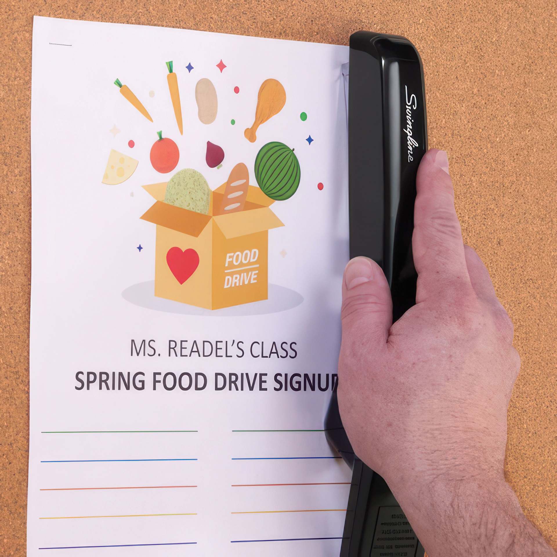 Swingline 747 Antimicrobial Business Stapler stapling to corkboard
