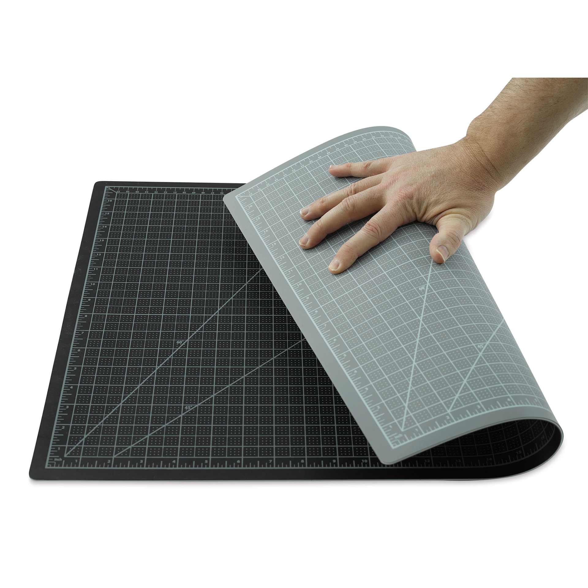 Blick Self-Healing Cutting Mats (Gray/Black Being Folded Over) Blick Self-Healing Cutting Mats (Gray/Black Being Folded Over)