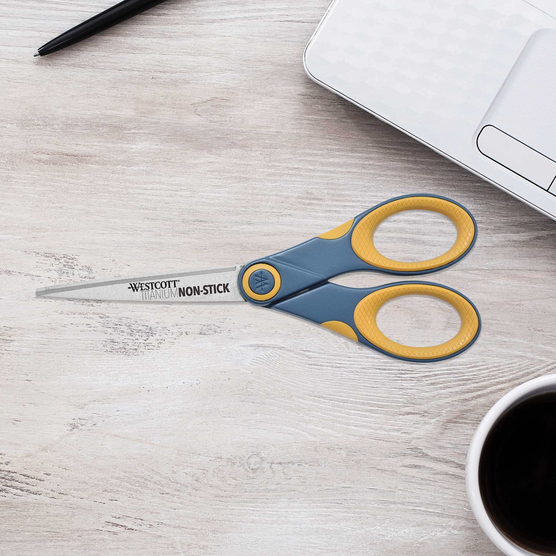 Westcott Straight Titanium Bonded Non-Stick Scissors - 7" sitting closed on table