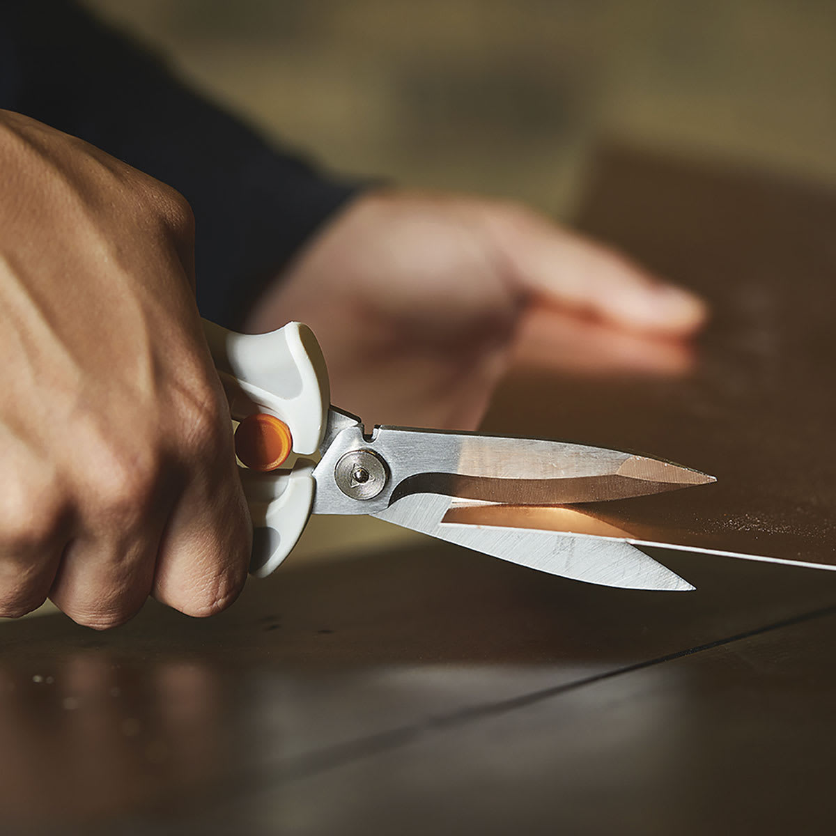 PowerCut Easy Action Snips - Closeup of Snips cutting metal sheet

