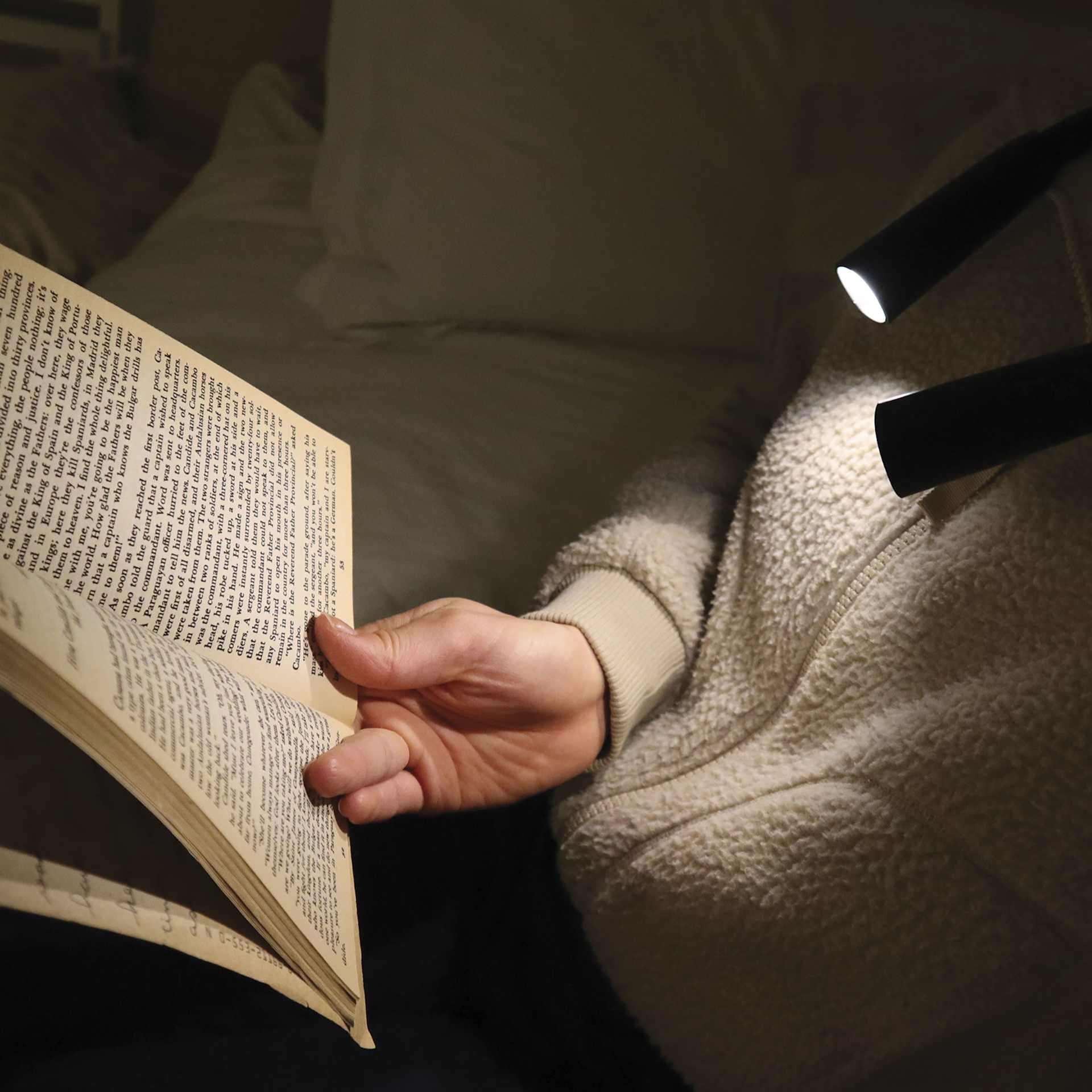 Kikkerland Hands-Free Book Light, book being read with light