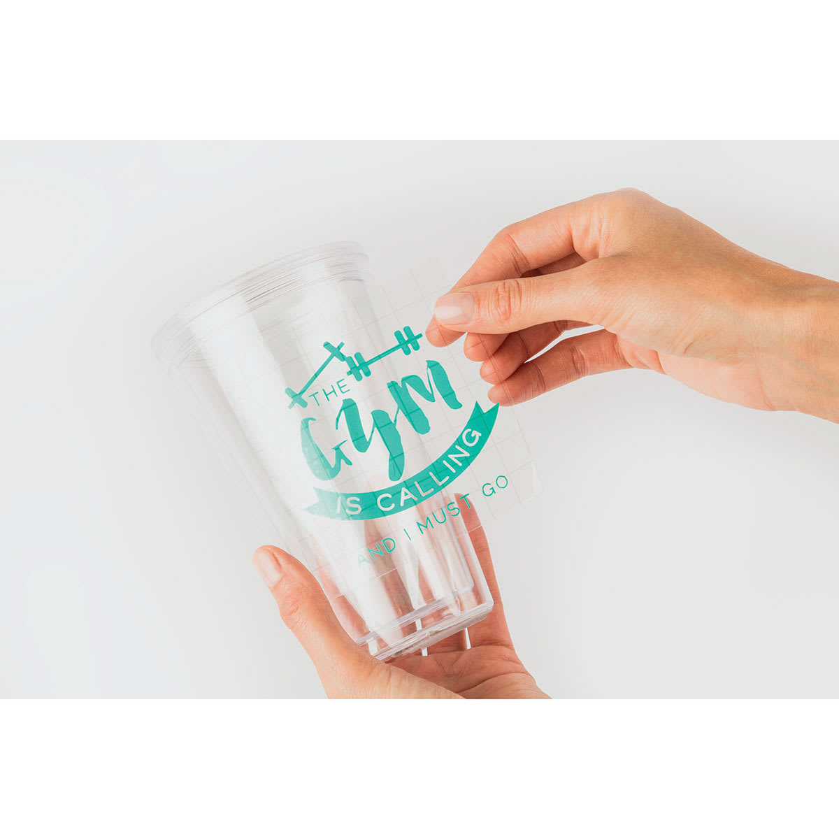 Cricut Transfer Tape applying design to cup
