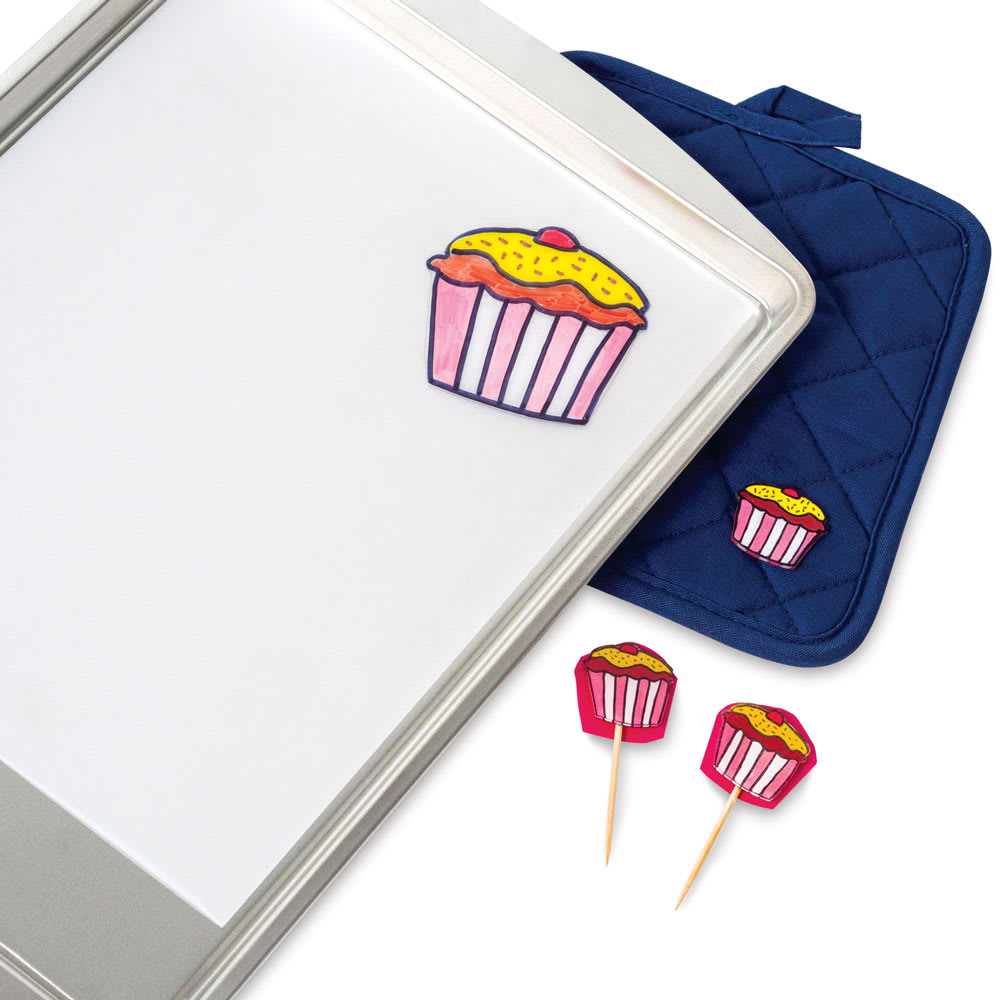 Grafix Shrink Films - Finished cupcake motifs shown on potholder and toothpicks made with clear film