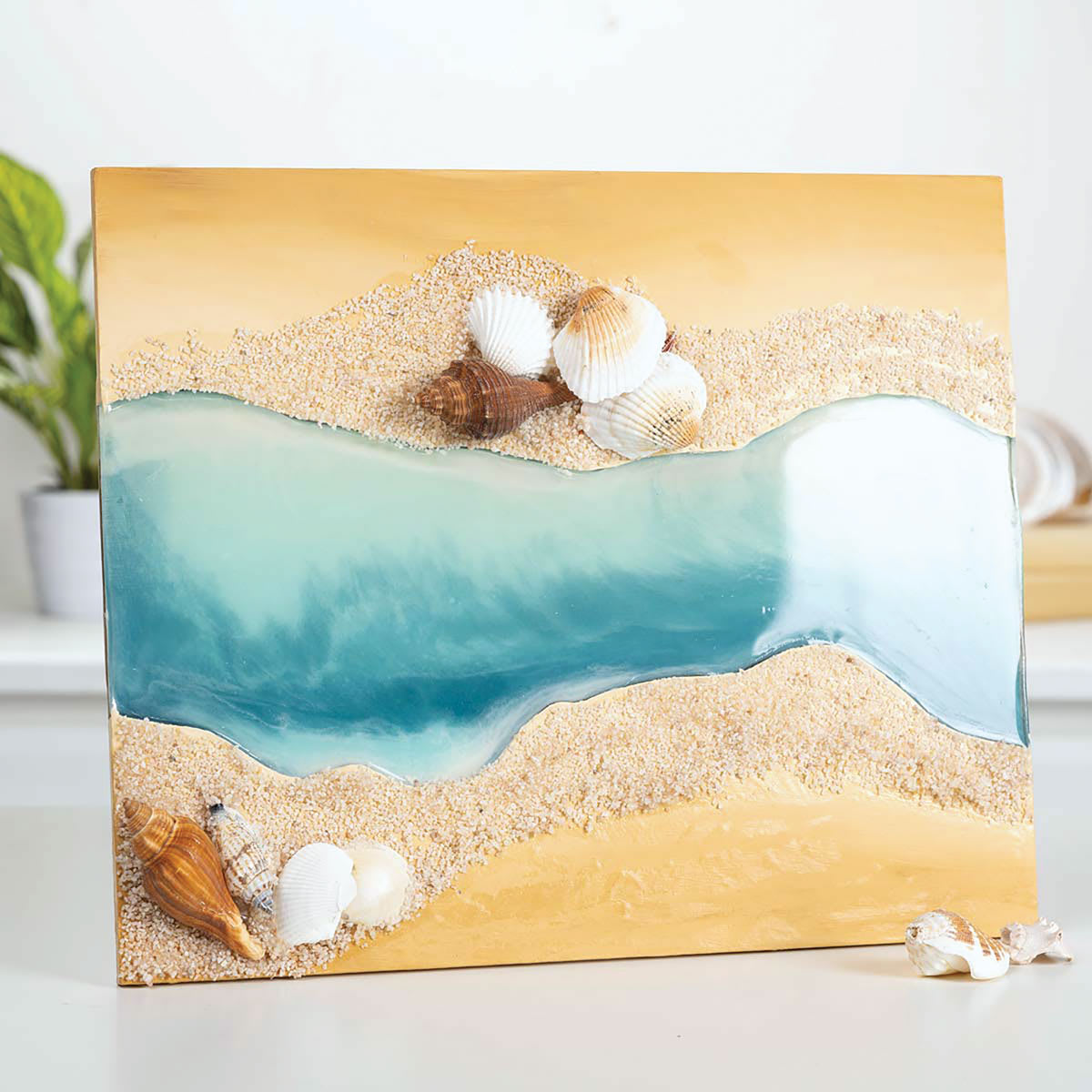 Mod Podge Resin Pouring River Plaque (finished example with a beach theme)
