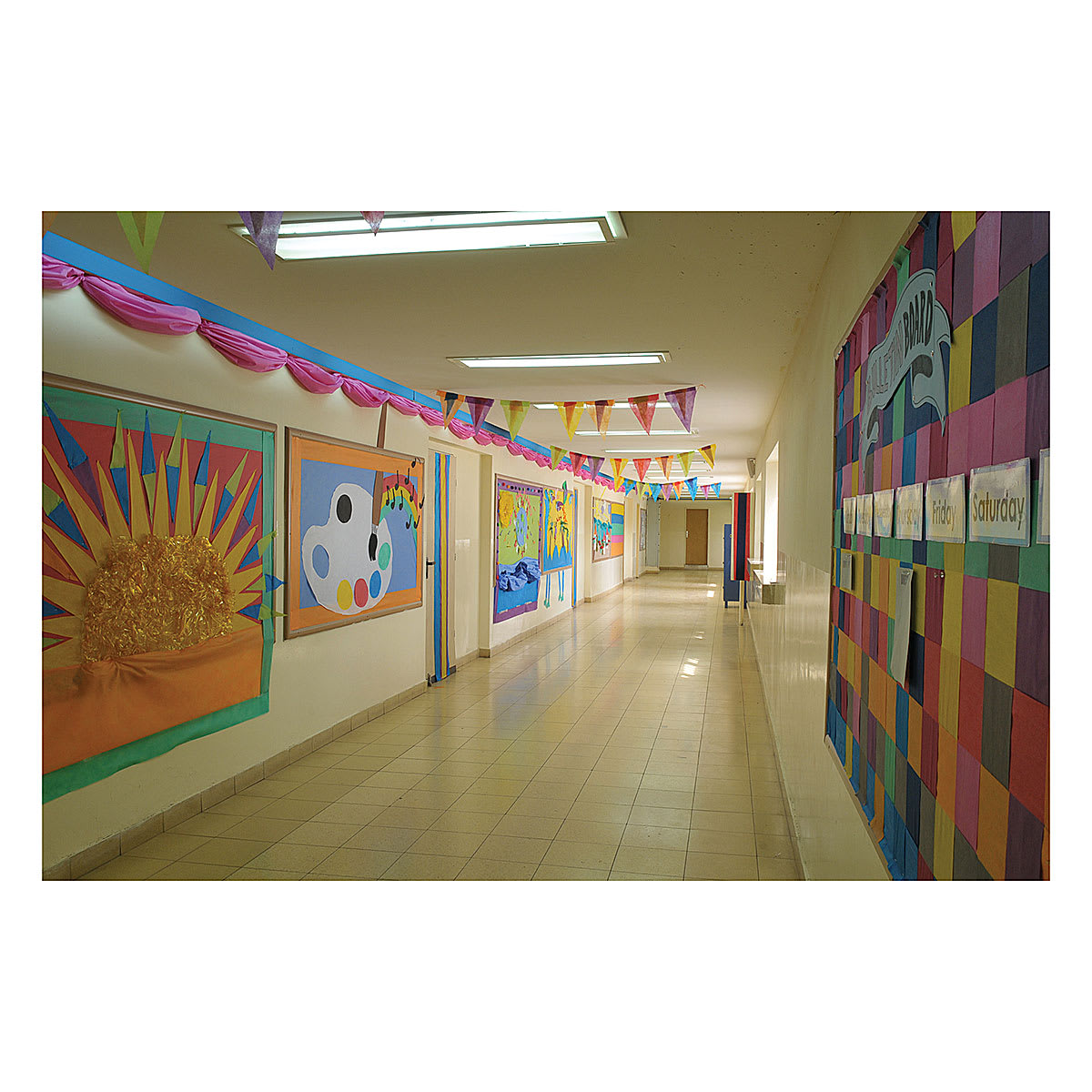 Smart-Fab Art and Decoration Fabric - School hallway decorated with art in various colors of fabric 
